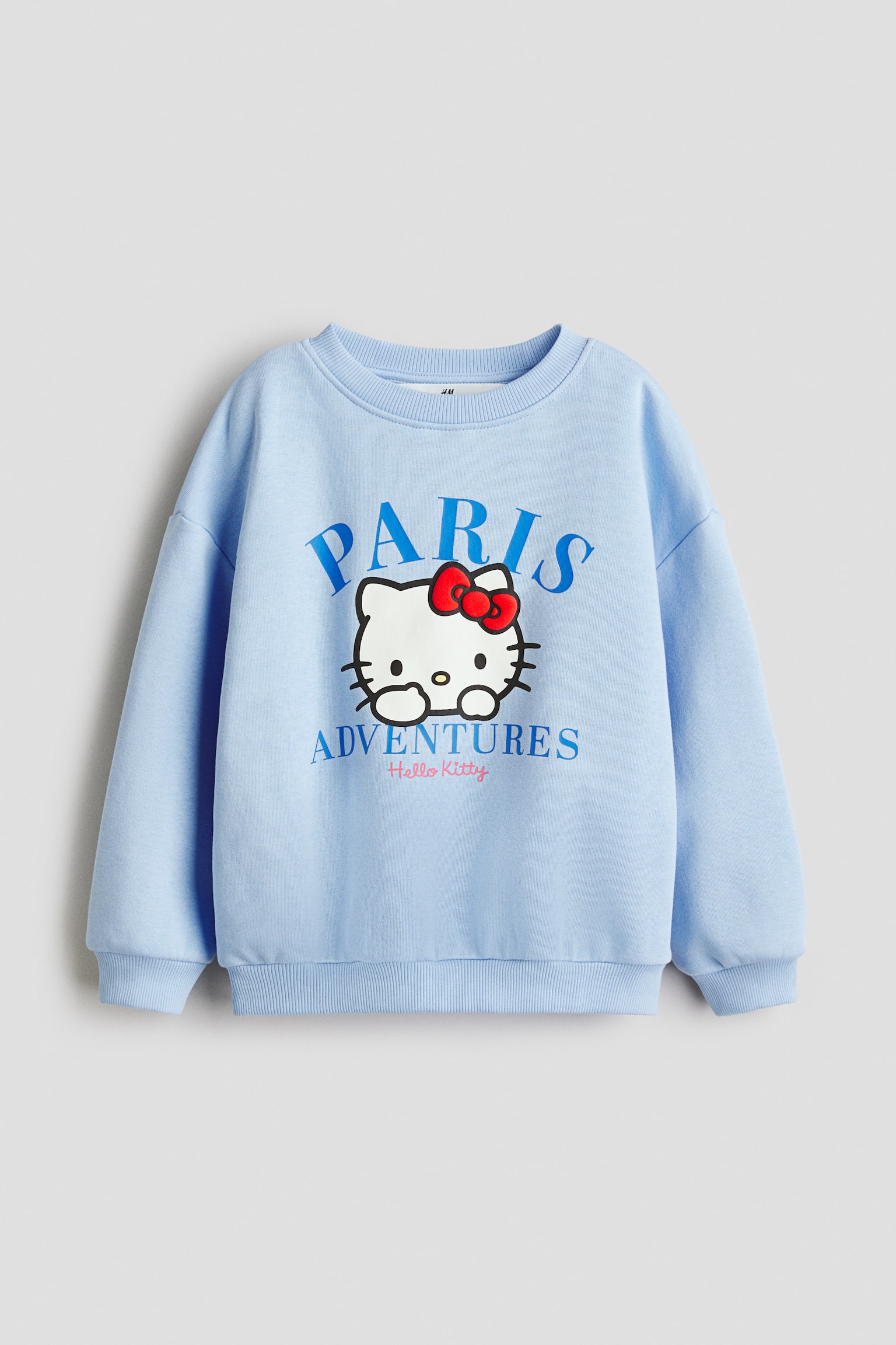 סווטשירט עם הדפס - תכלת/הלו קיטי/ורוד/מיני מאוס/קרם/הלו קיטי/ורוד/הלו קיטי/קרם/בלואי/צהוב/הלו קיטי/סגול/לילו וסטיץ'/תכלת/לשבור את הקרח/לבן/הלו קיטי/בז' בהיר/במבי - 1
