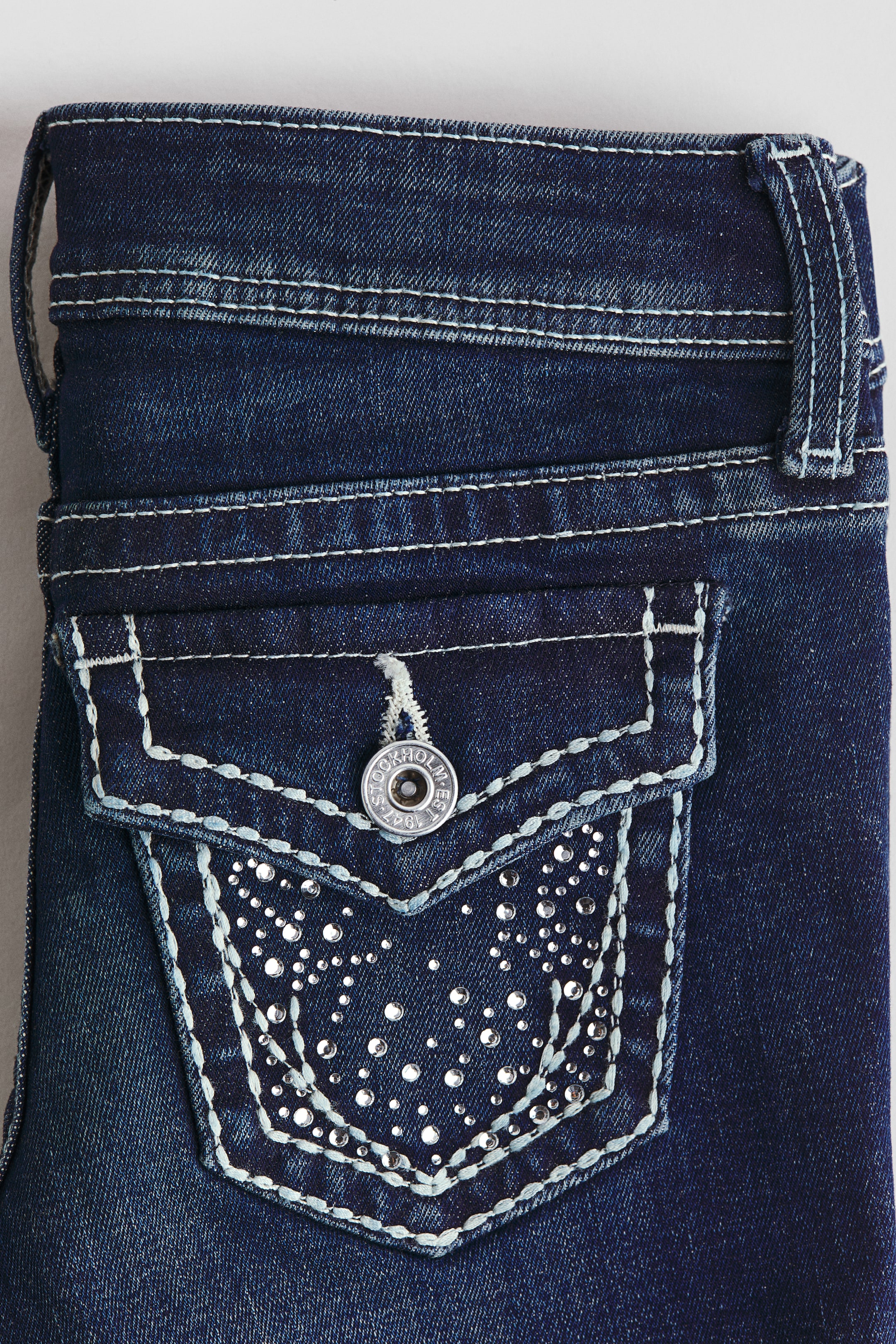 Embroidered-Detail Flared Low Jeans