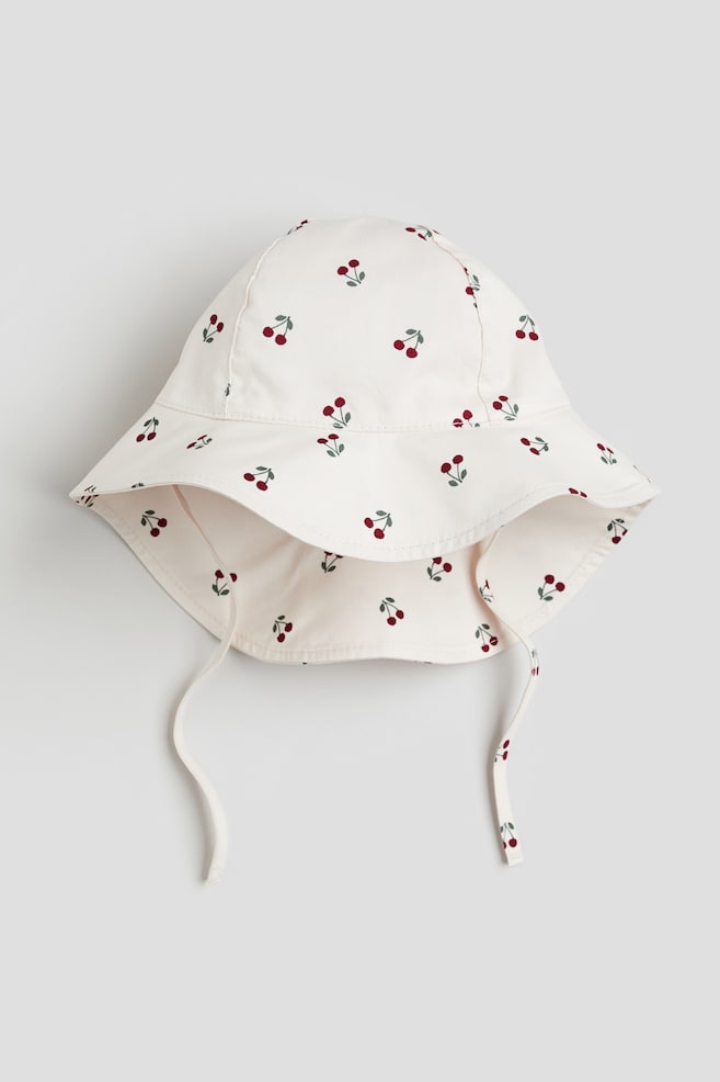 Patterned cotton sun hat - Cream/Cherries - 1