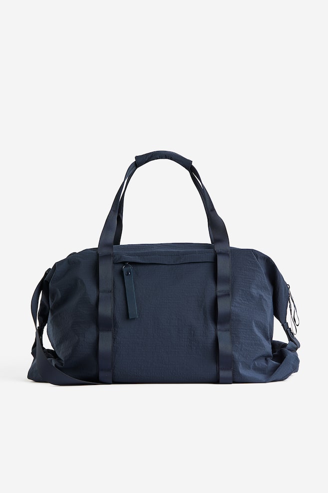 Water-repellent sports bag - Blue/Black - 1