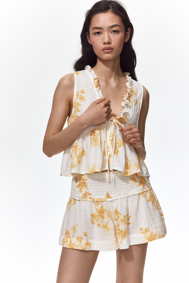 Bluza od muslina sa volanom