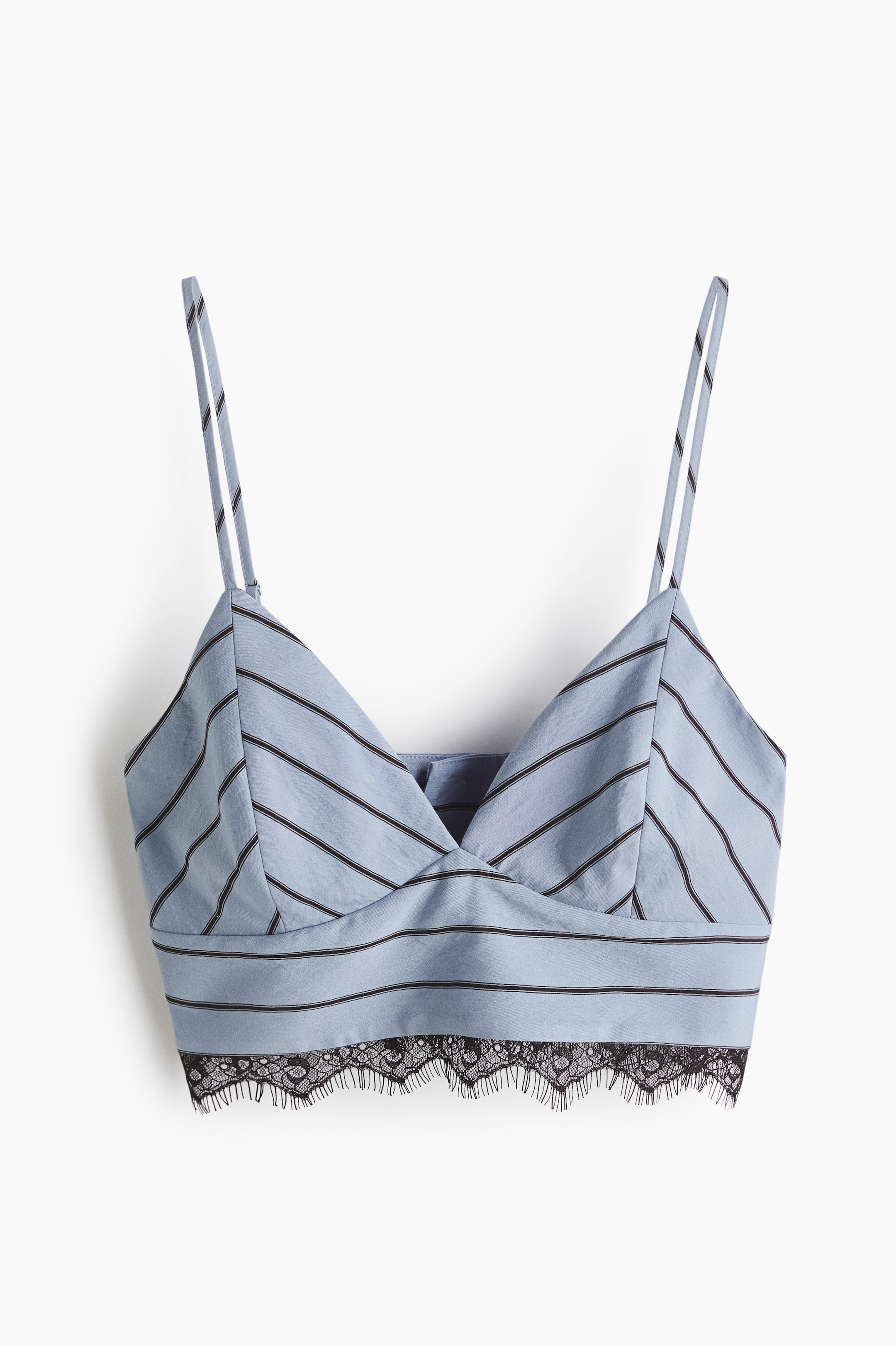 View larger image: A light blue bralette top is facing front, showcasing thin dark stripes and a black scalloped lace trim embellishing its cropped hem. The structured bust cups display diagonal stripes, while the main body features horizontal stripes, and thin double spaghetti straps form the shoulders.