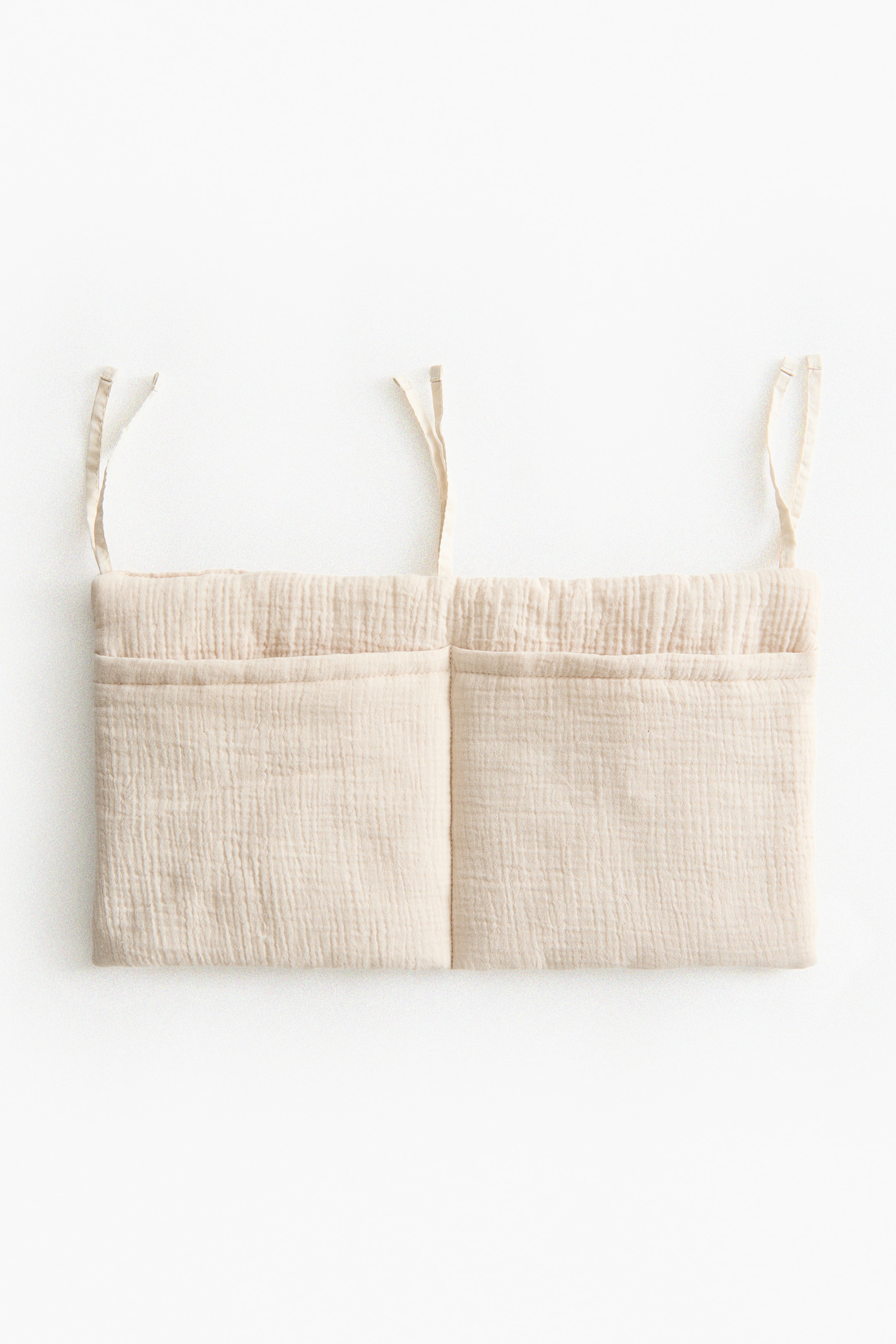 Visa större bild: Vägghängd förvaringskorg i muslin - Ljusbeige - Home All | H&M FI 2