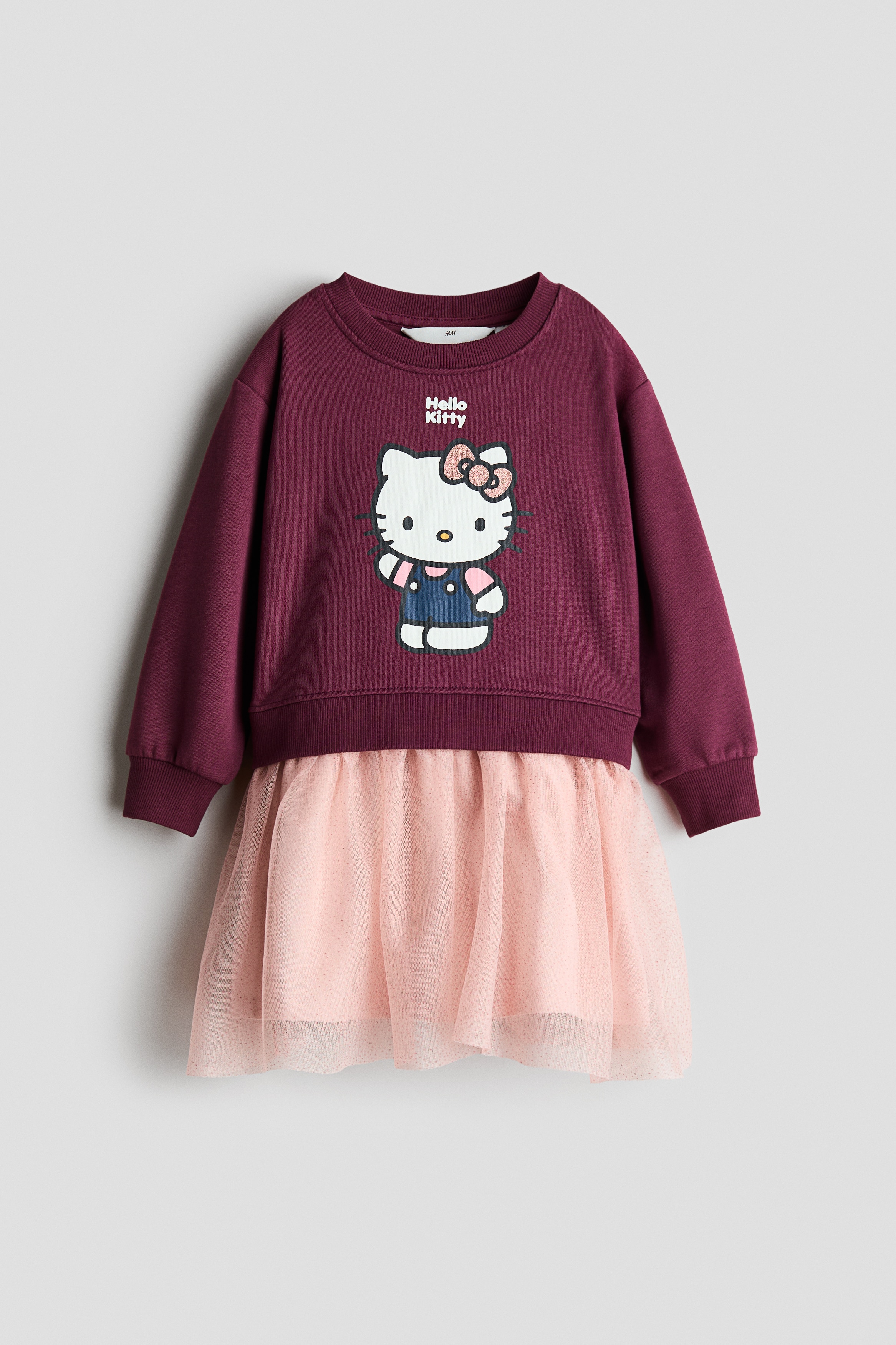 Bedrucktes Kleid mit TülljupeModell