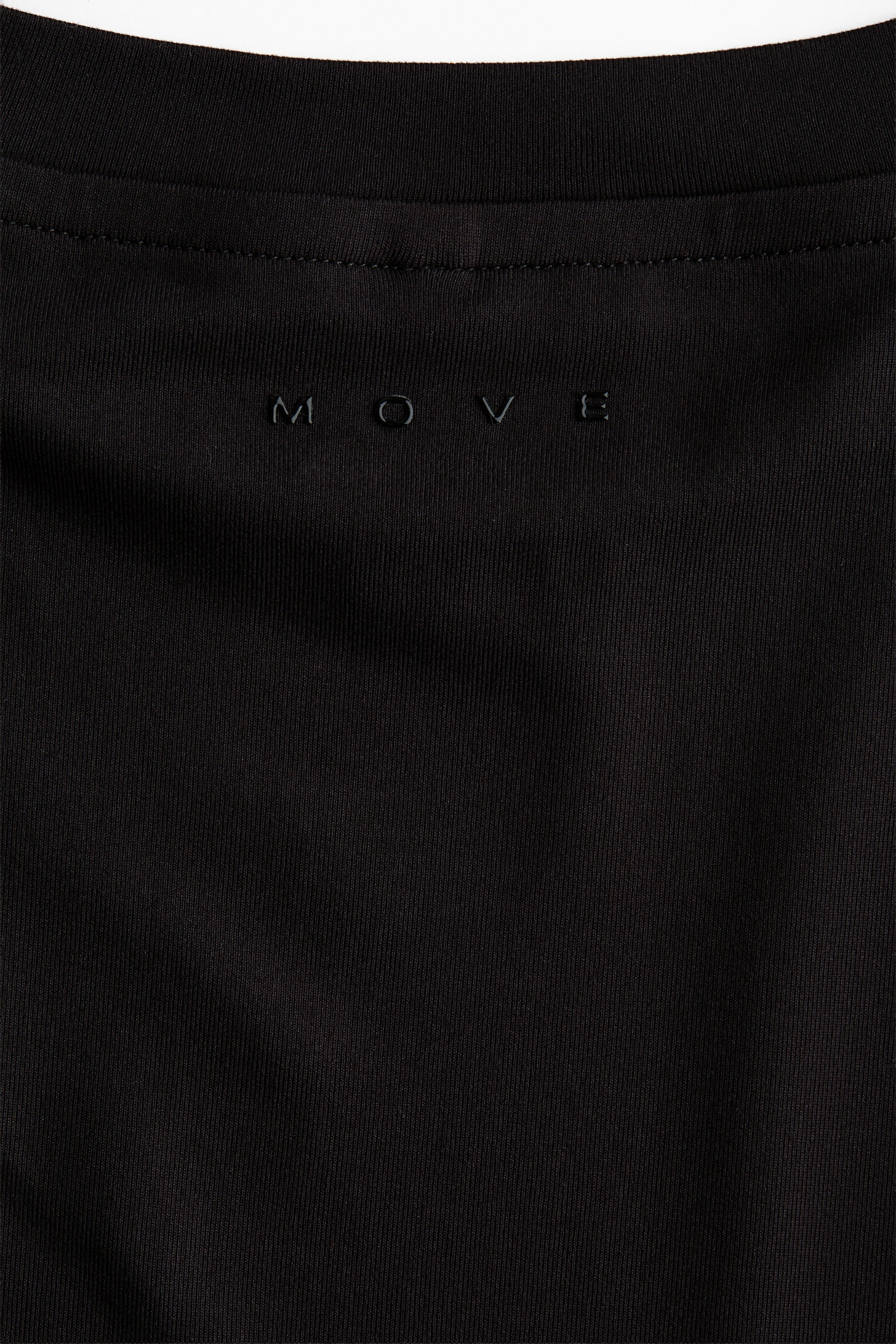 Ampliar la imagen: Sports top with SoftMove™ - Negro - Kids | H&M MX 6