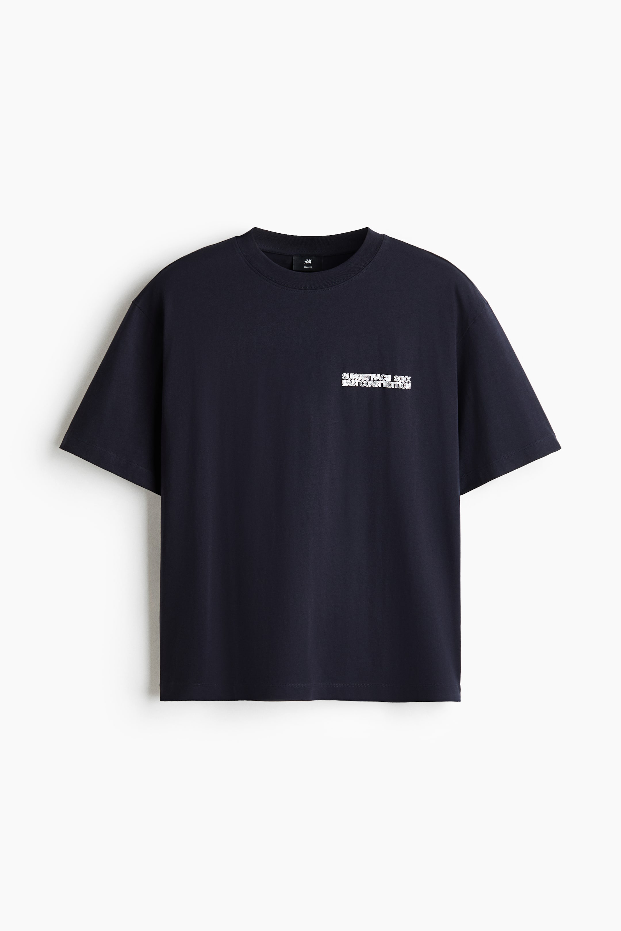 View larger image: "A deep blue T-shirt is showcased from the front. It features a white text print on the chest, a round ribbed neckline, dropped shoulders, a straight-cut hem, and offers a relaxed fit."