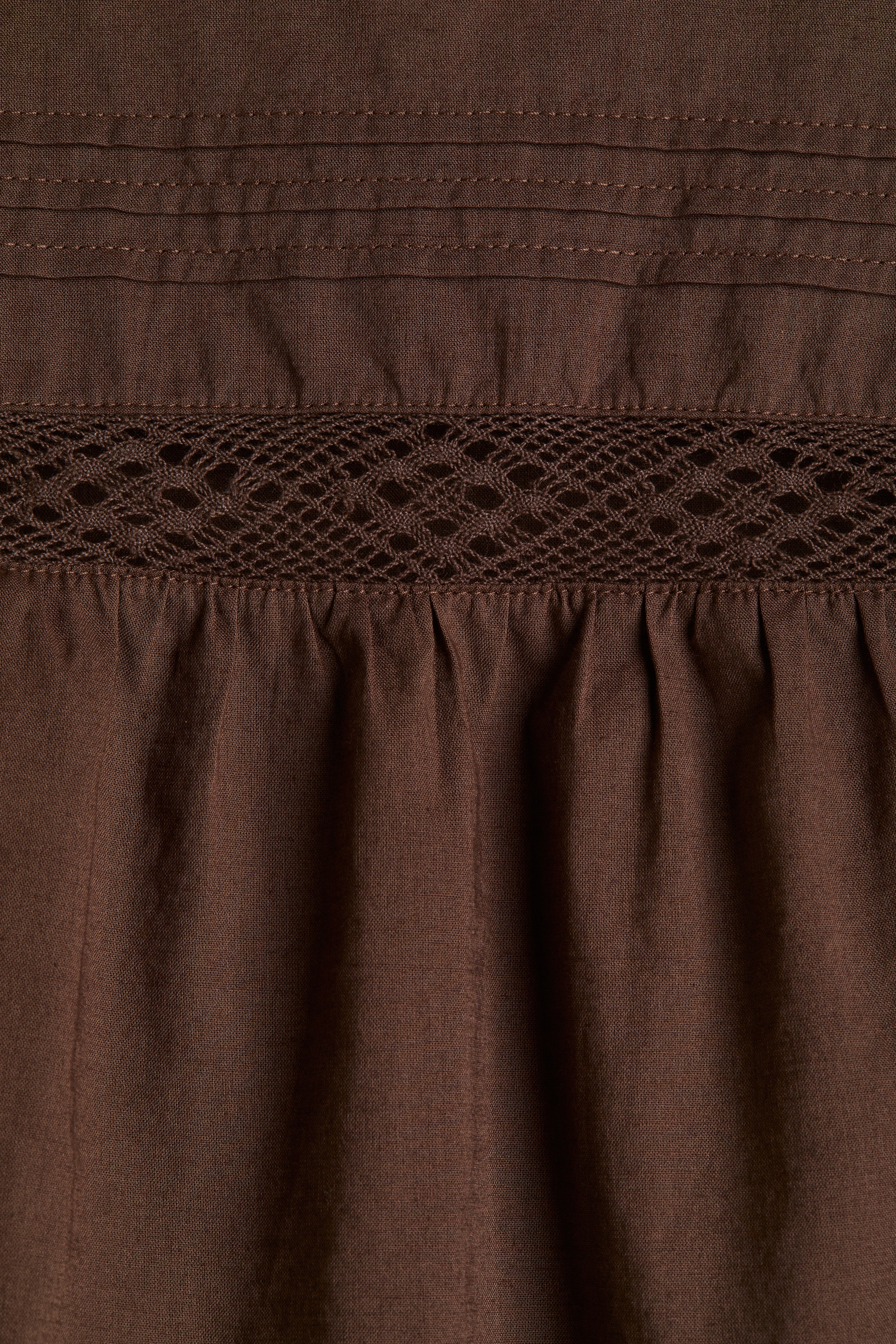 Lace-inset peplum blouse