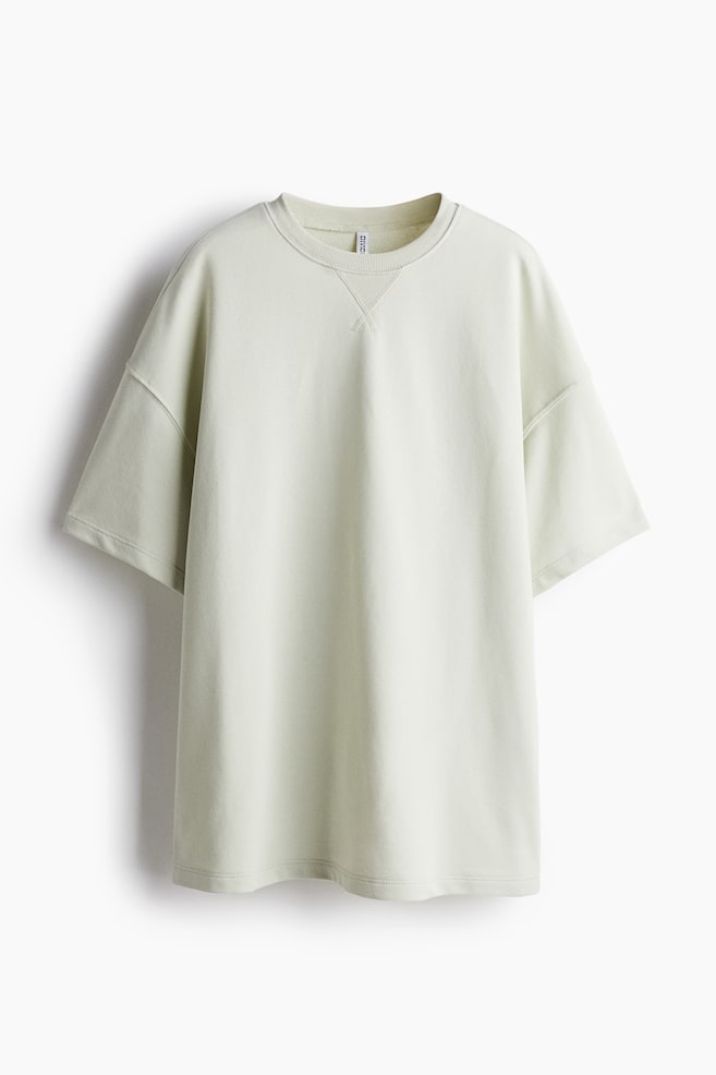 Oversized short-sleeved sweatshirt - Light dusty green - 1