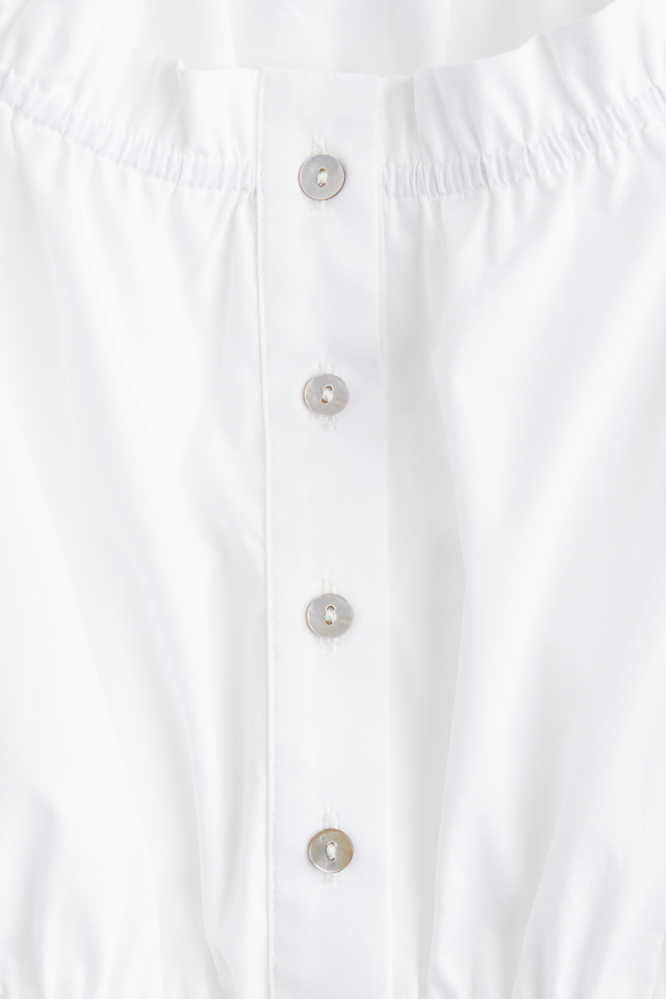 Frill-trimmed cotton blouse