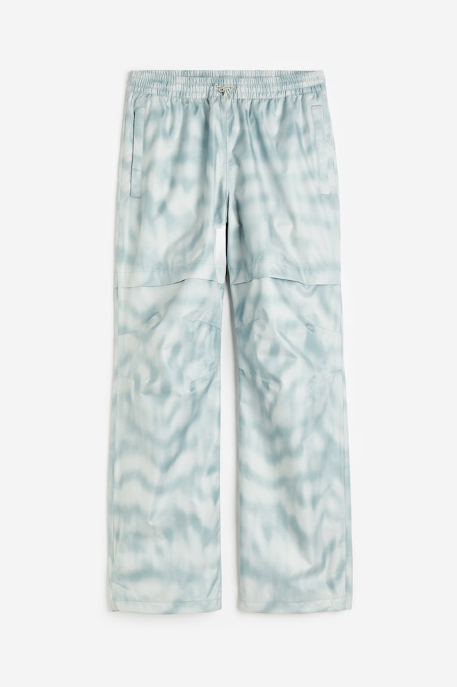 Pantalon de pluie en textile StormMove™ - Bleu clair/motif - 1