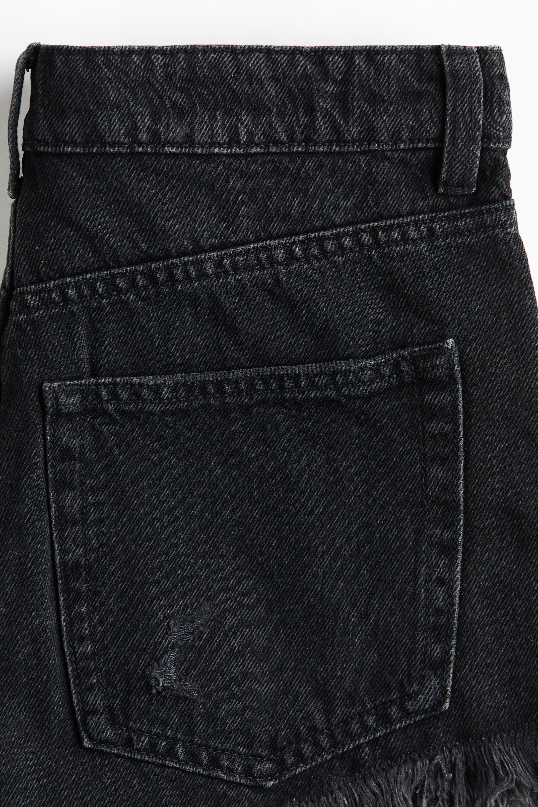 Short en denim à effet usé