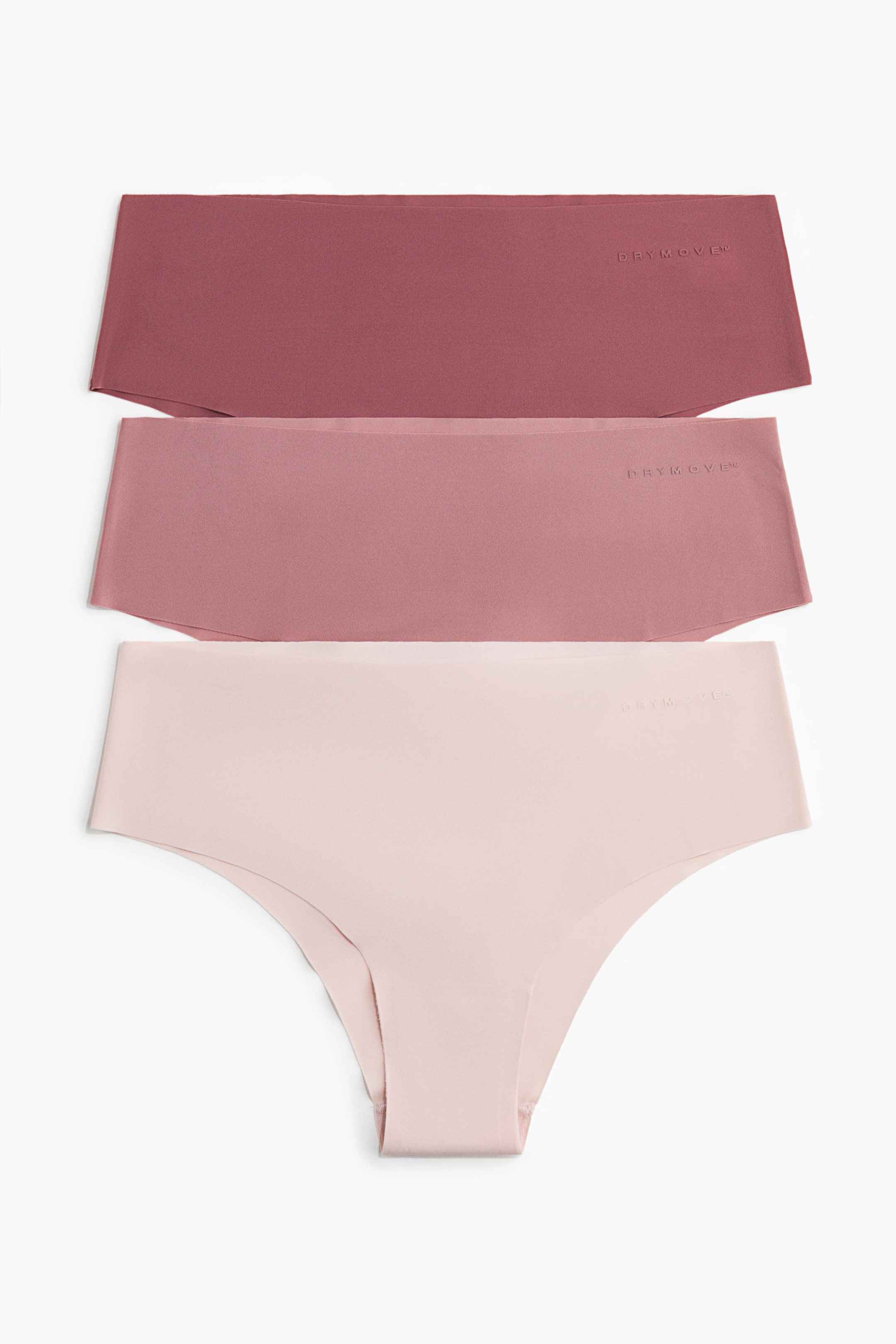 Ampliar la imagen: Se muestra un paquete de tres calzoncillos deportivos tipo hipster, que incluye tres calzoncillos sin costuras en diferentes tonos de rosa, desde un rosa oscuro hasta un nude claro. Están dispuestos de forma plana, parcialmente superpuestos, y cada uno exhibe la marca "DRYMOVE" cerca de la pretina en la parte frontal.