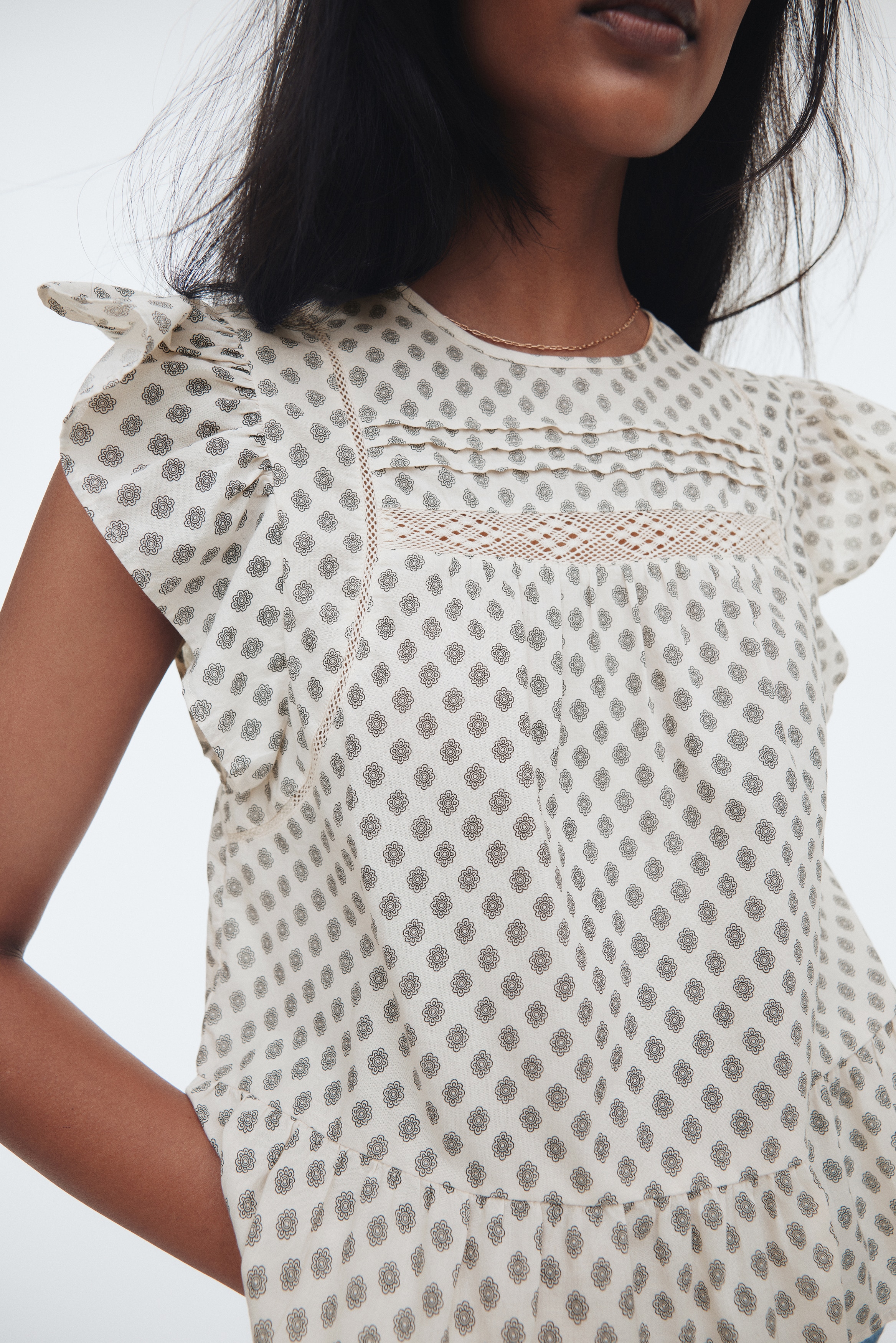 Lace-inset peplum blouse