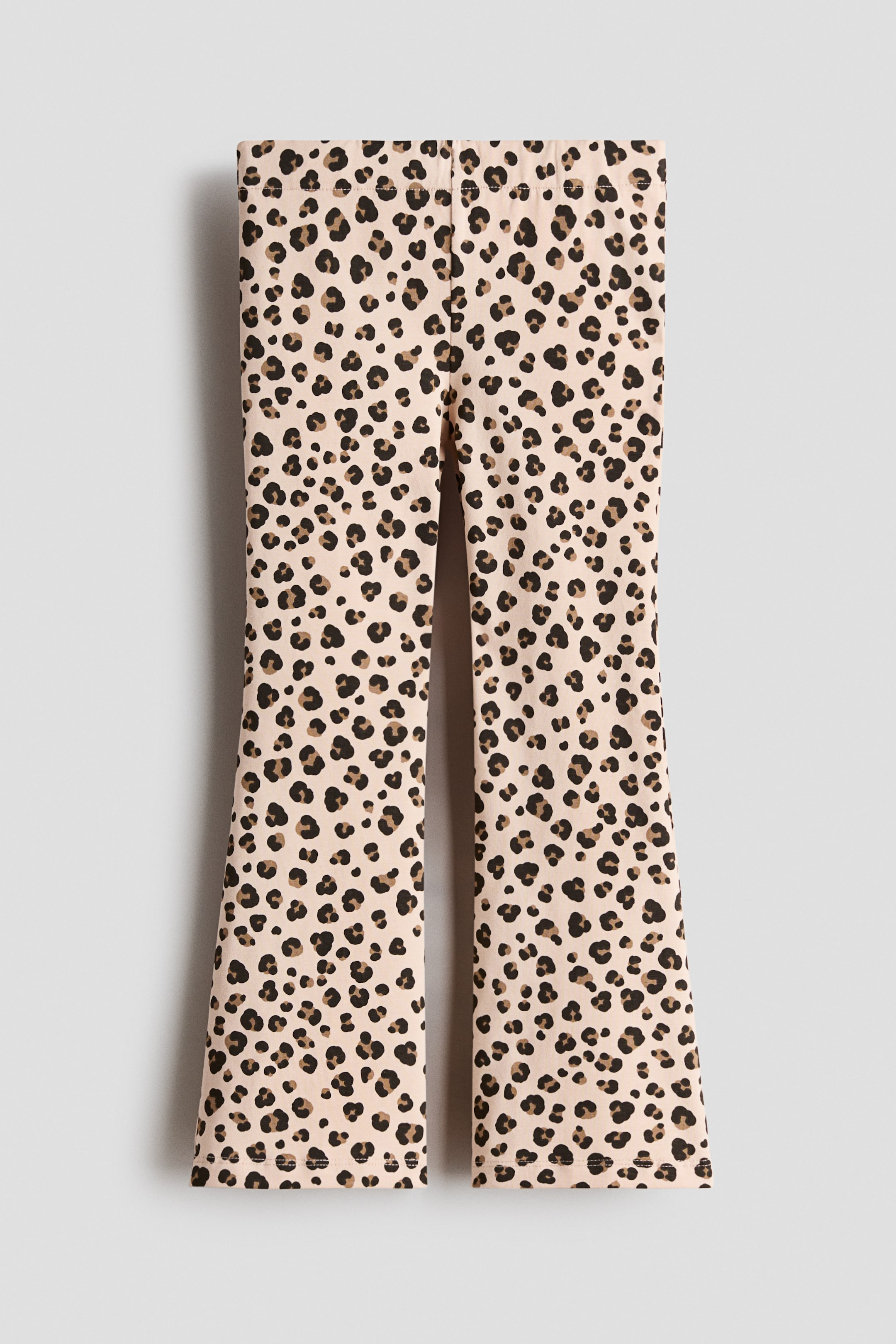 View larger image: Leggings in soft cotton jersey are presented as FRONT, showcasing a leopard print pattern and featuring an adjustable, elasticated waist and flared legs.