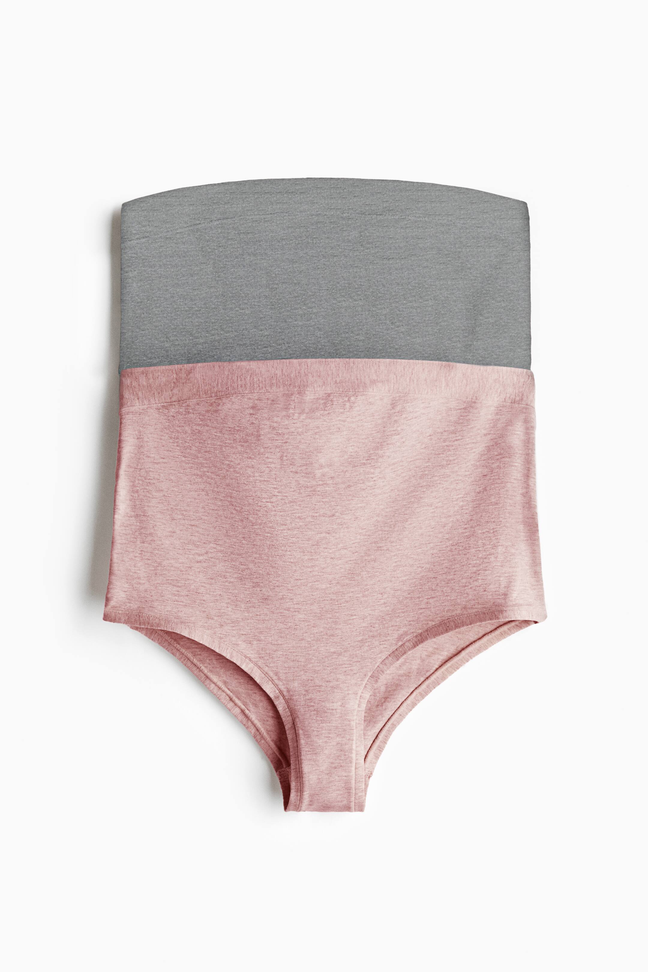 Grotere afbeelding bekijken: Deze zachte katoenen jersey slip is van voren afgebeeld en heeft een hoge grijze tailleband en een roze hoofddeel. Het ontwerp heeft hoge beenopeningen.