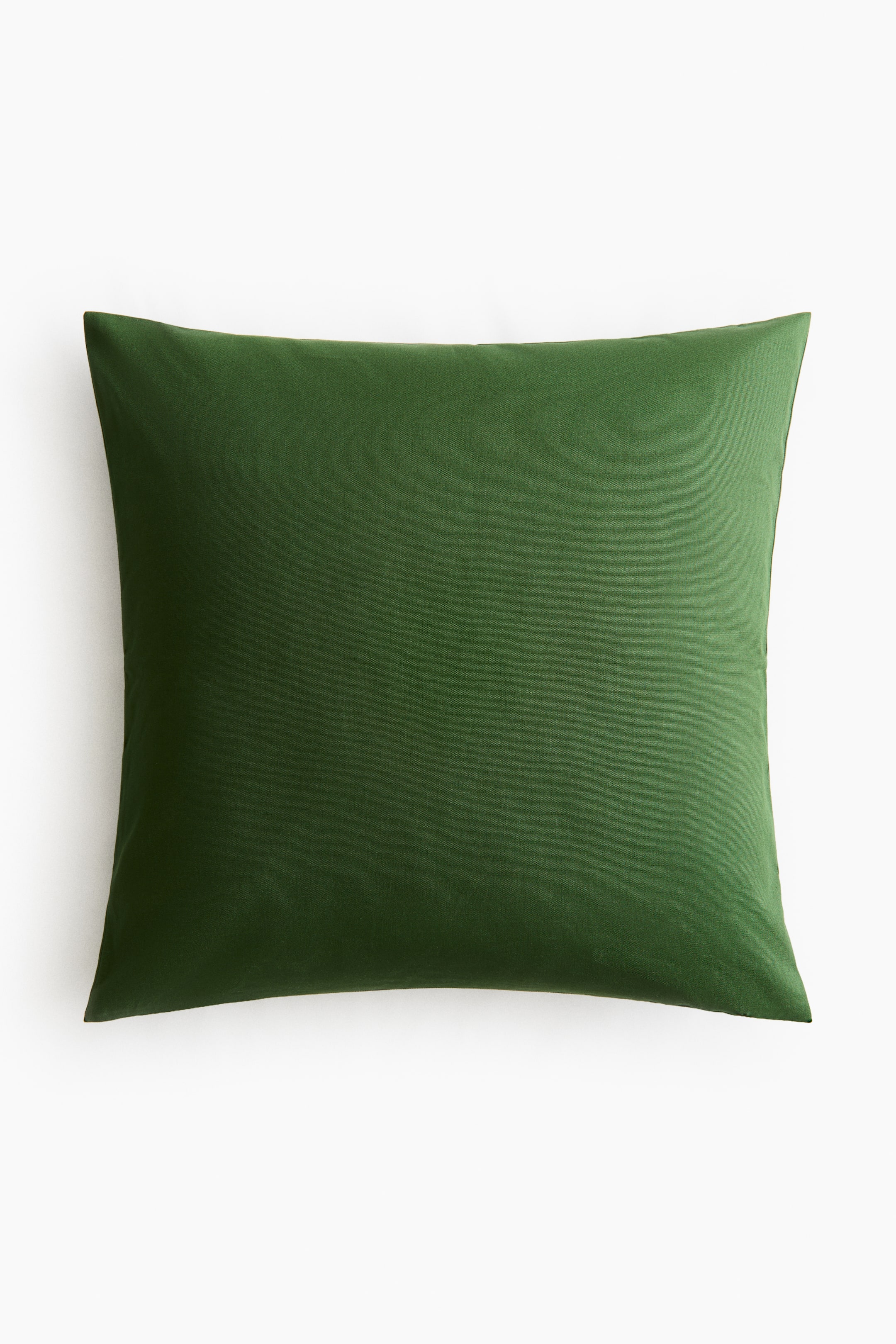 View larger image: A deep green cushion cover is shown from the front, featuring a subtly textured woven fabric.