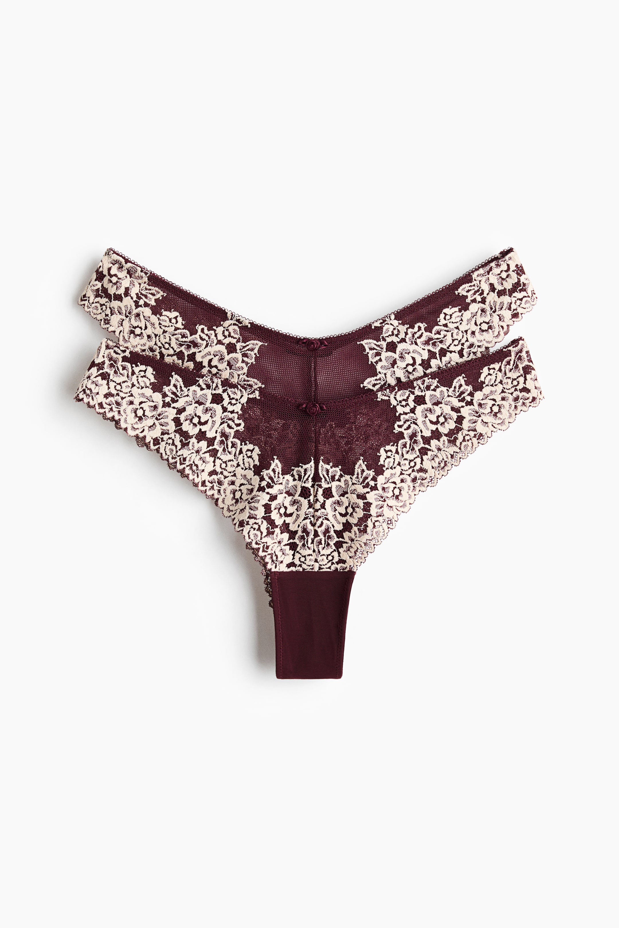 View larger image: These briefs feature a low, V-shaped front waist, crafted from maroon mesh and embellished with cream floral lace. Two small bows accentuate the center of the V-waist.