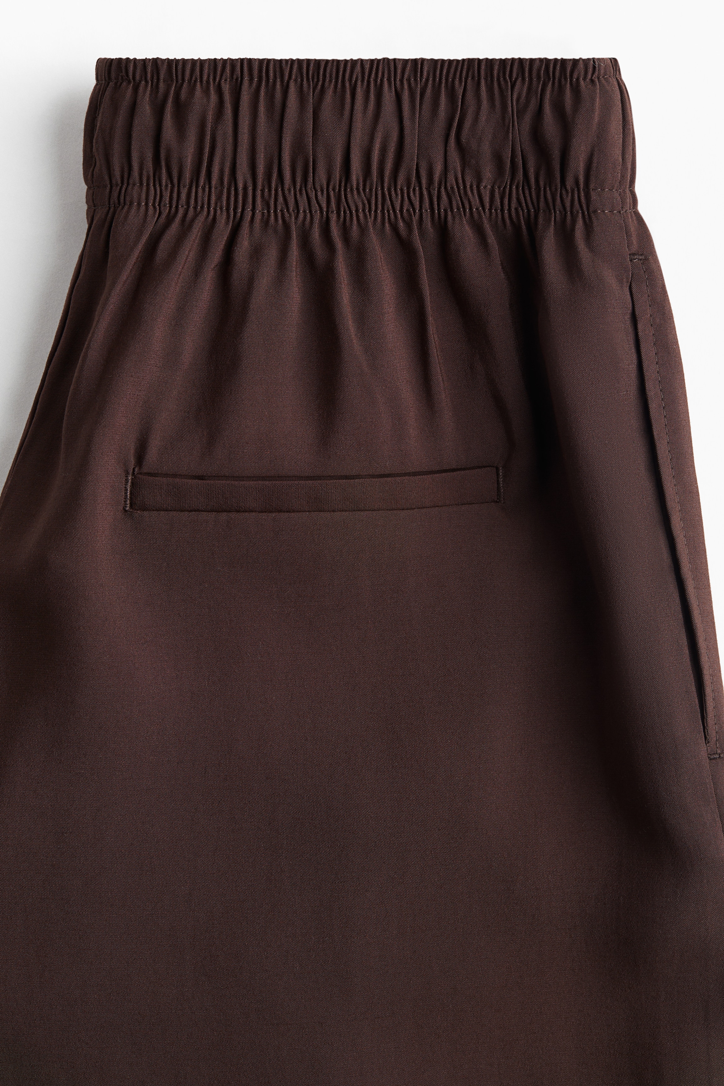 Wide tie-belt trousers