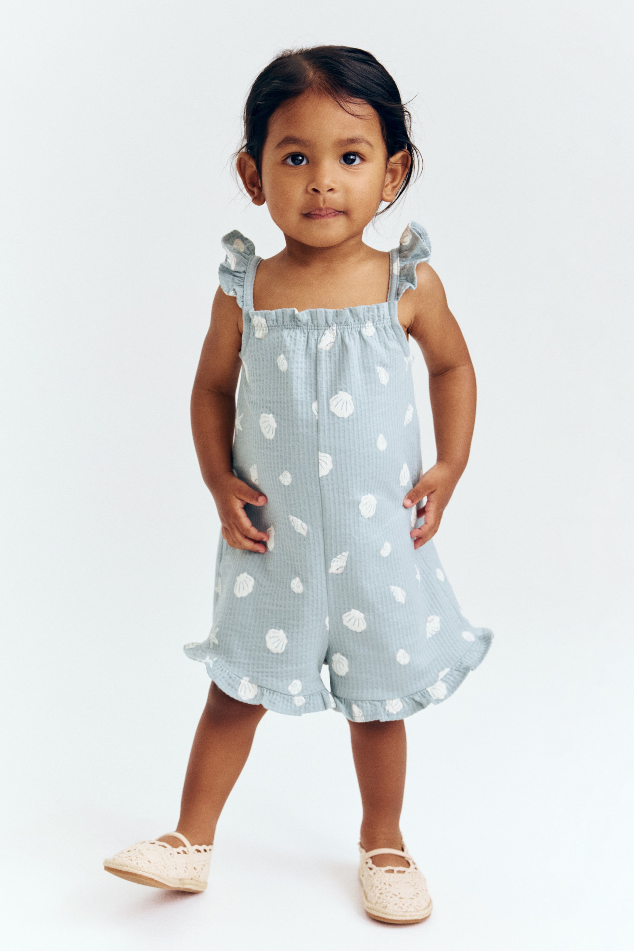 View larger image: Sleeveless jersey romper suit - Light turquoise/Seashells - Kids | H&M 1