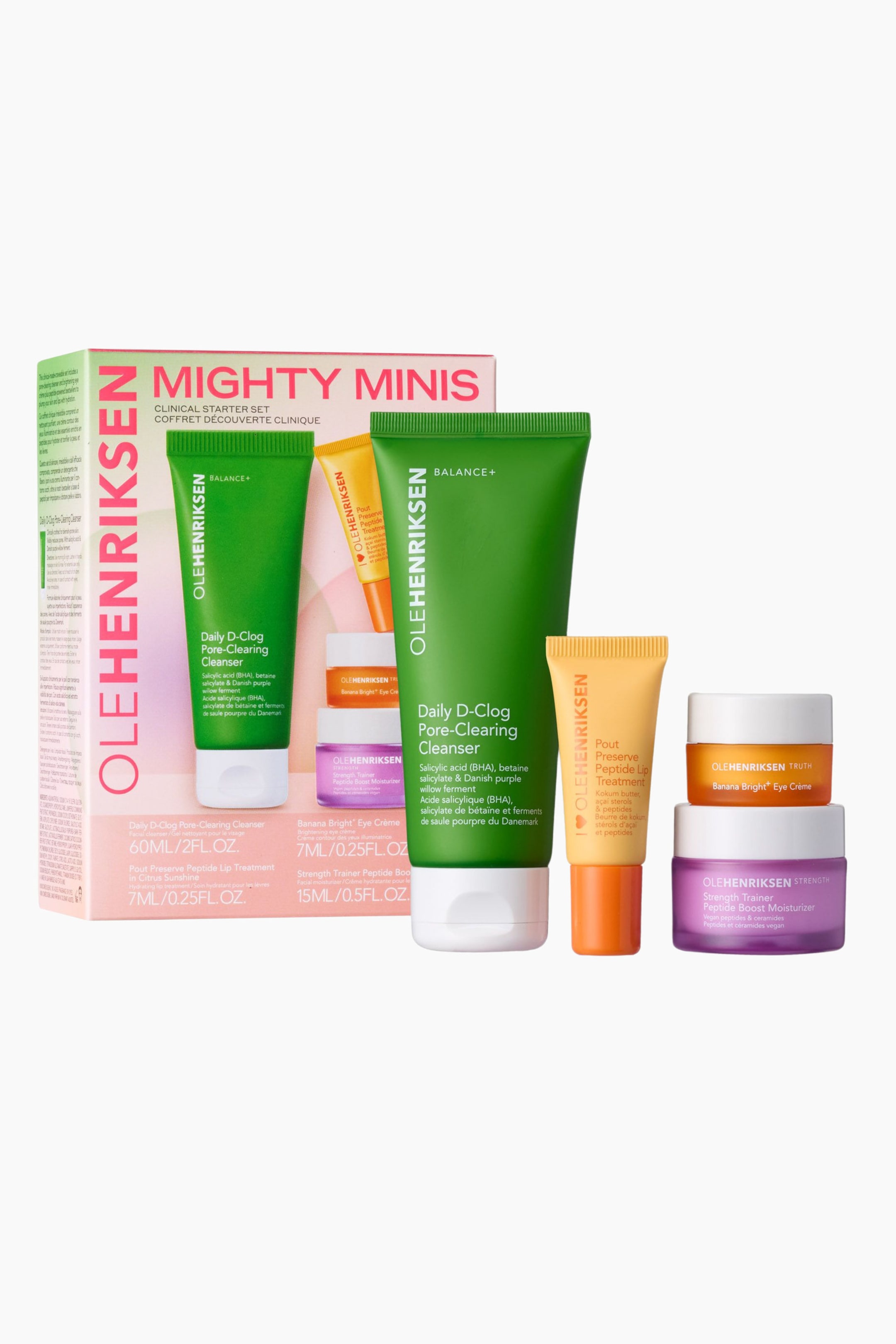 Visa större bild: Ett OLEHENRIKSEN Mighty Minis Clinical Starter Set visar upp fyra hudvårdsprodukter. En ljusrosa och vit ask är delvis öppen och avslöjar en grön rengöringstub, en gul tub med läppbehandling, en orange burk med ögonkräm och en lila burk med fuktkräm, och dessa fyra produkter står också upprätt utanför asken, så att deras individuella etiketter och OLEHENRIKSEN-varumärket syns.
