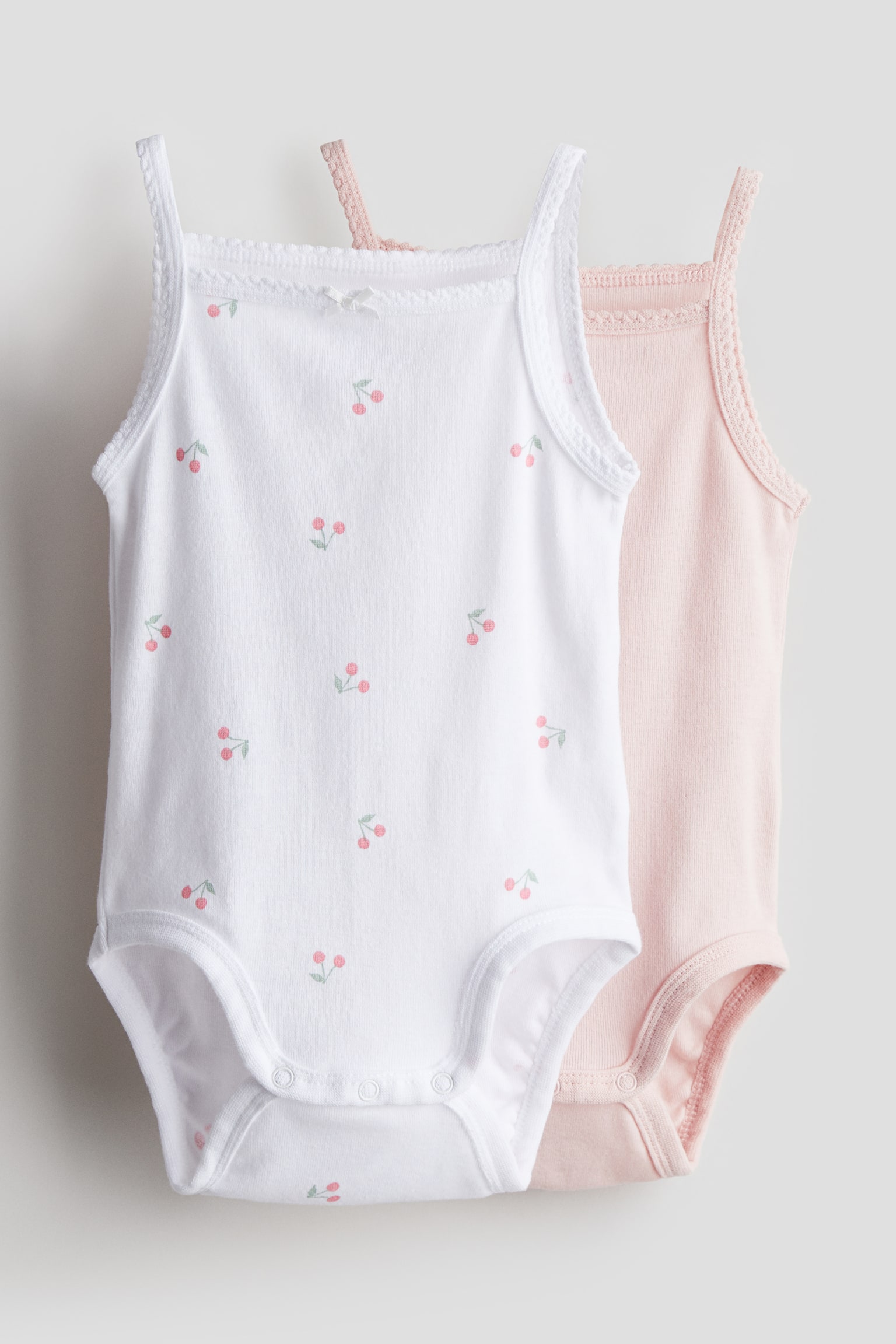 2-pack Sleeveless Cotton Bodysuits - Light pink/Cherries/Dusty green/Giraffes - 1