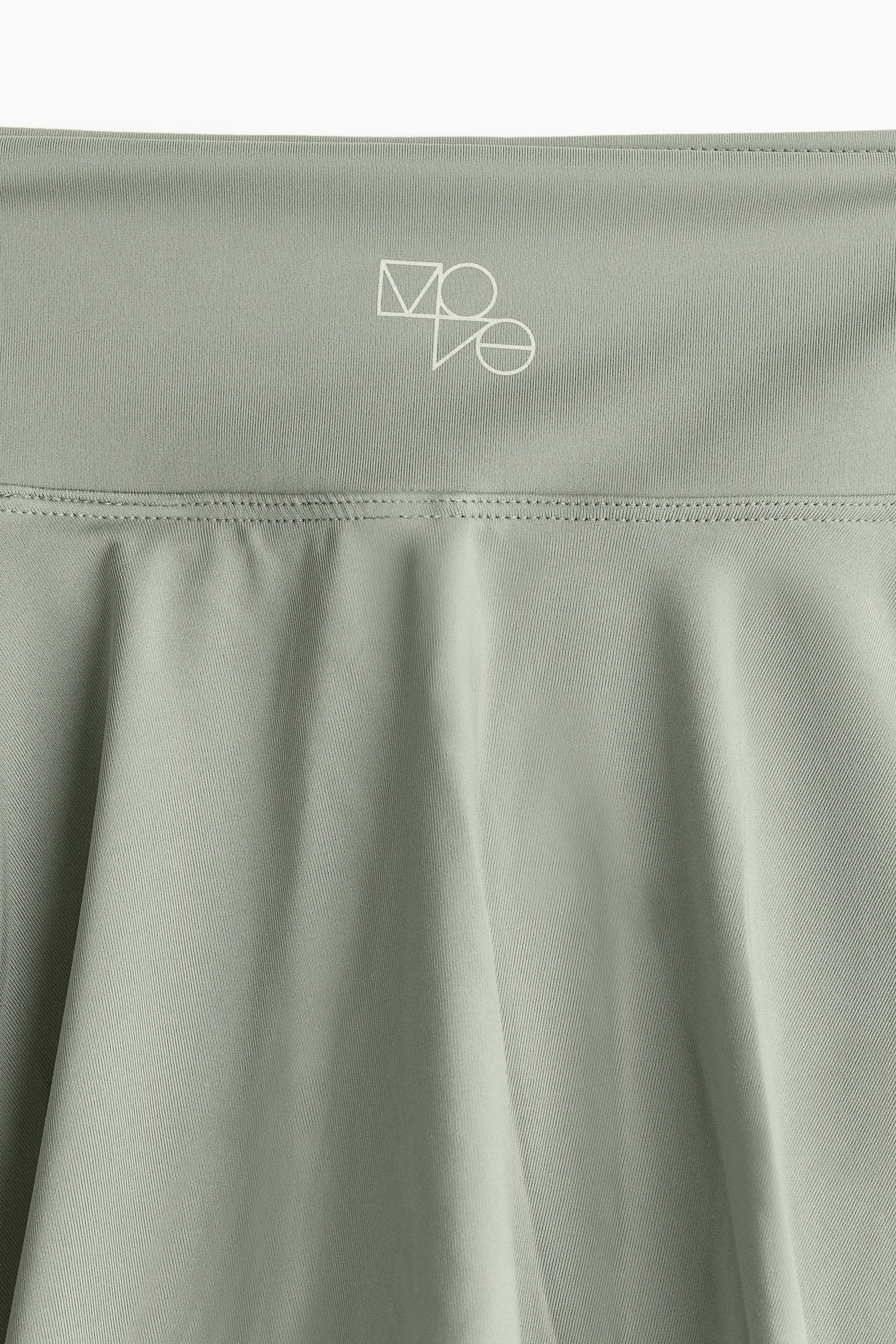 Circle Cut Tennis Skirt In DryMove™ - Light khaki green/White/Black - 8