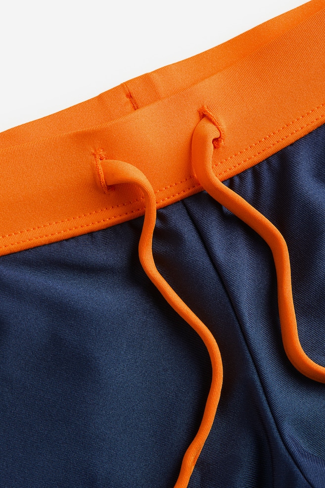 Swimming trunks - Navy blue/Bright orange/Navy blue/Striped - 2