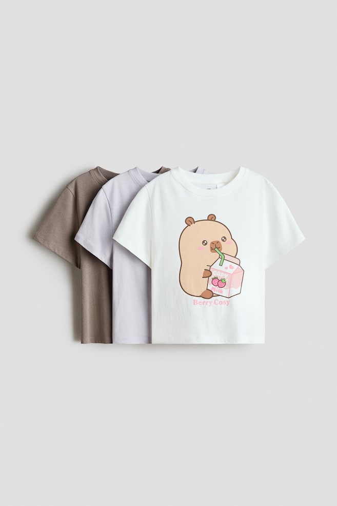 3-pack Printed Jersey Tops - Pale purple/CapyFun/Light blue/CapyFun/Light pink/Hello Kitty/Beige/Lilo & Stitch/Cream/Frozen/Navy blue/Hello Kitty/Light pink/PAW Patrol/Yellow/Minnie Mouse/Light blue/Hello Kitty/Light blue/Lilo & Stitch/Light pink/KPop Demon Hunters/Pink/Lilo & Stitch/Light dusty blue/Minnie Mouse - 1