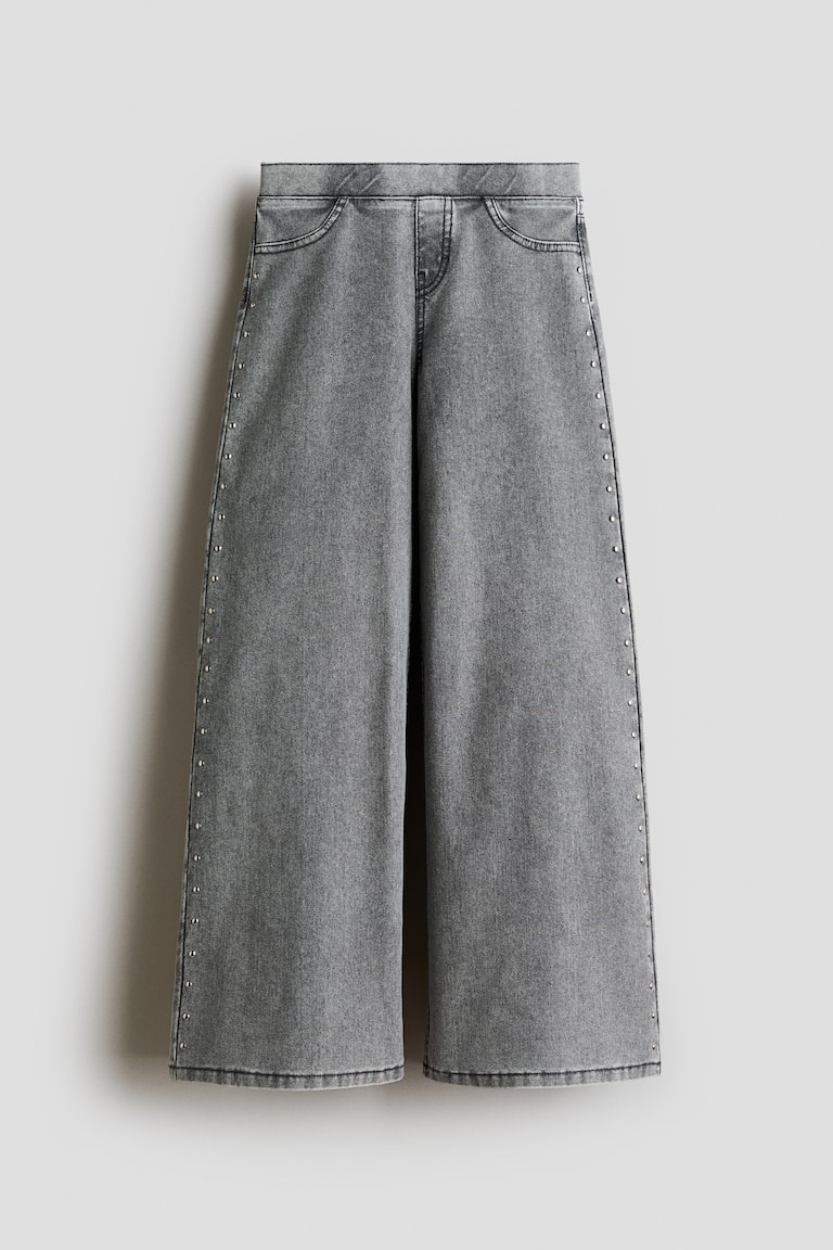 Pantalone s nitnama i izgledom teksasa