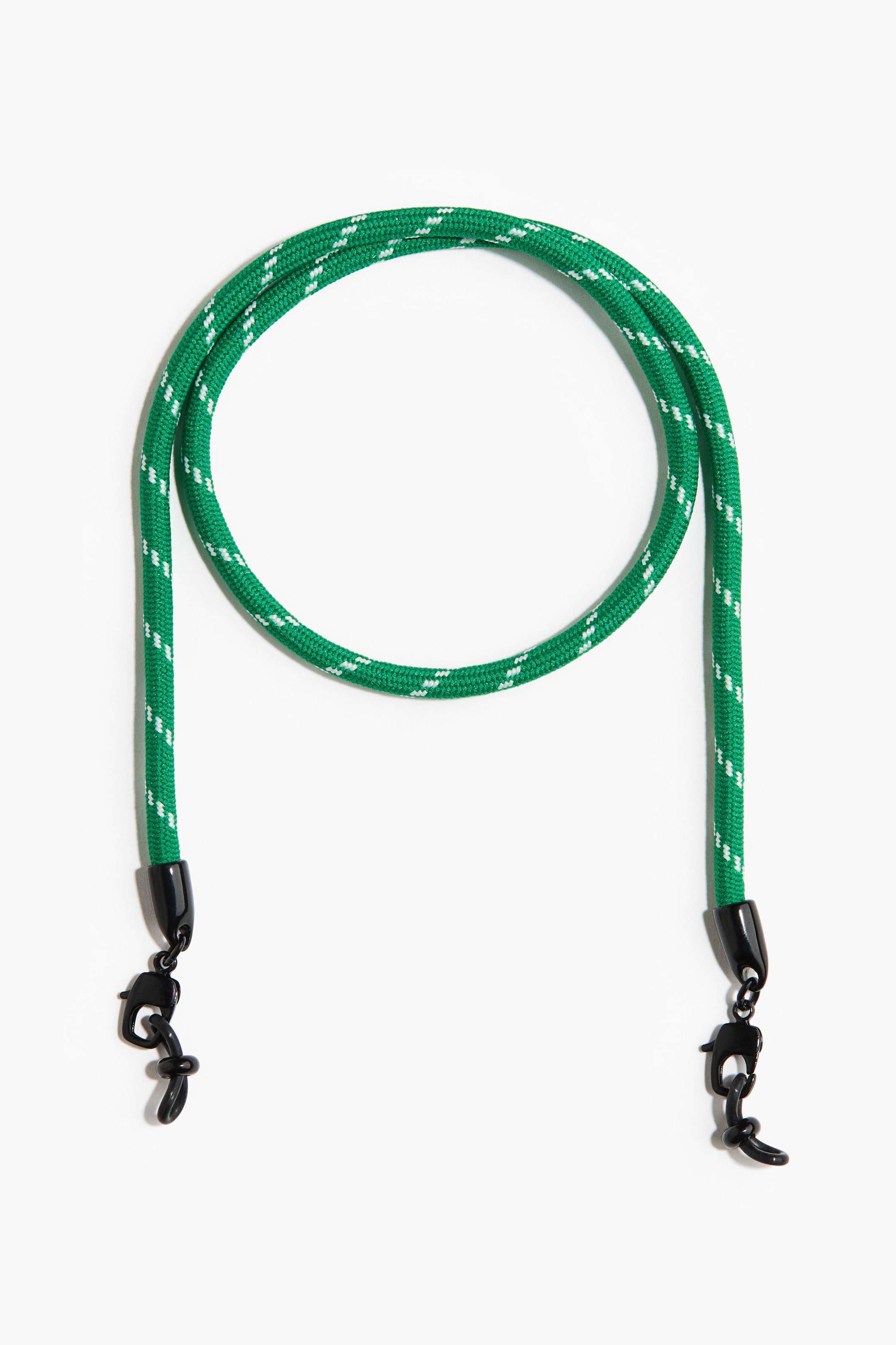 View larger image: From the front, a green cord with white diagonal dashes forms a large loop at the top, with two ends hanging down. Each end features a black cap, from which a black rubber loop clasp extends.