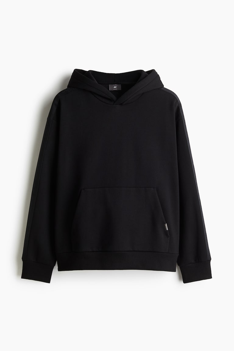 Loose Fit Hoodie with side stripes - Black - Men | H&M IN