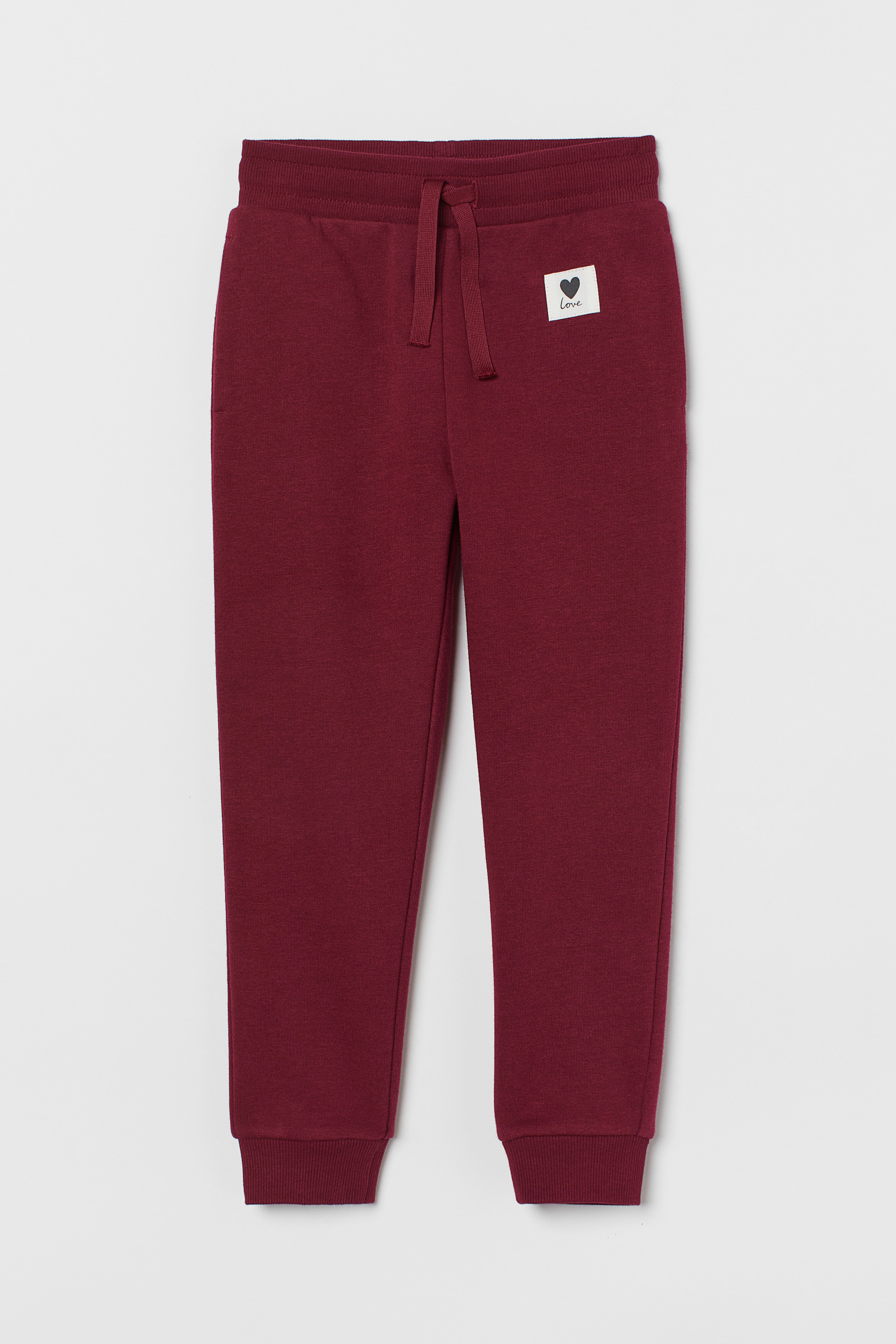 Red joggers h&m online