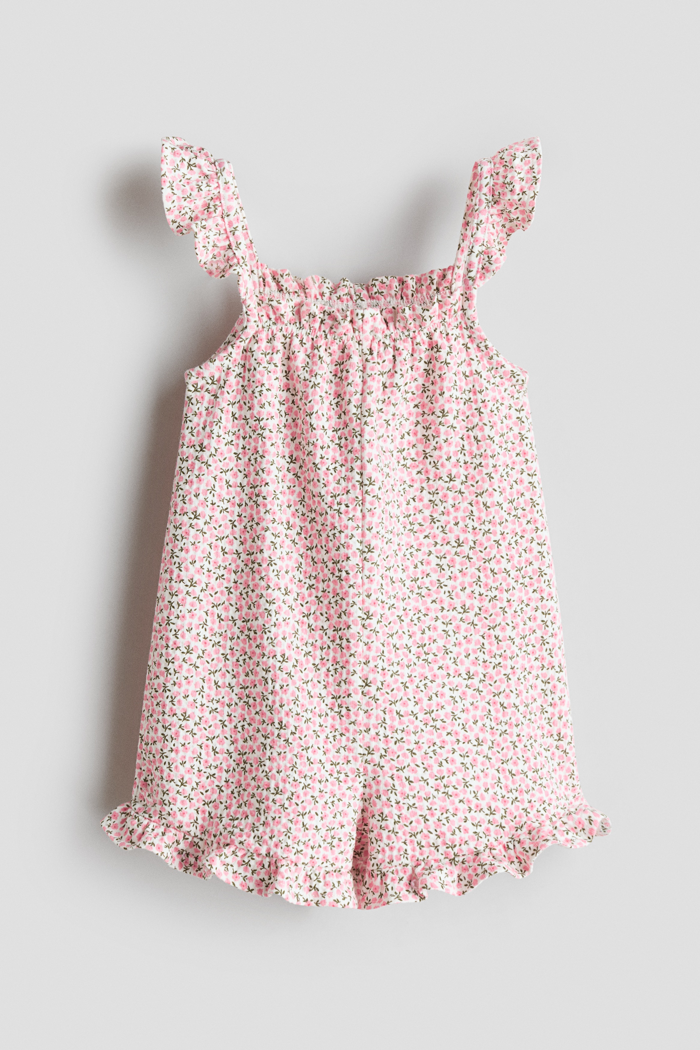 Sleeveless jersey romper suitModel