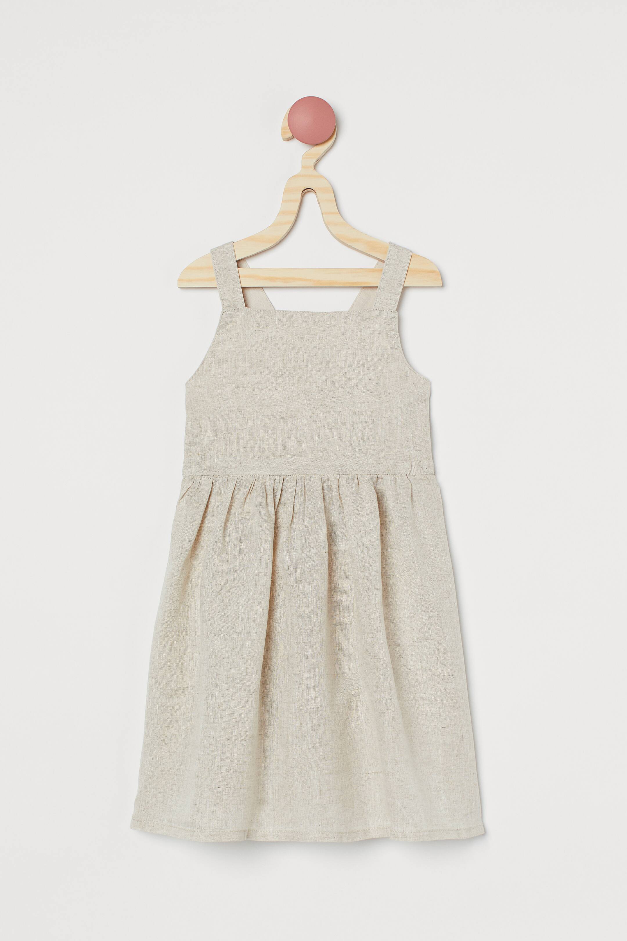 View larger image: Linen dungaree dress - Light beige - Kids | H&M 1