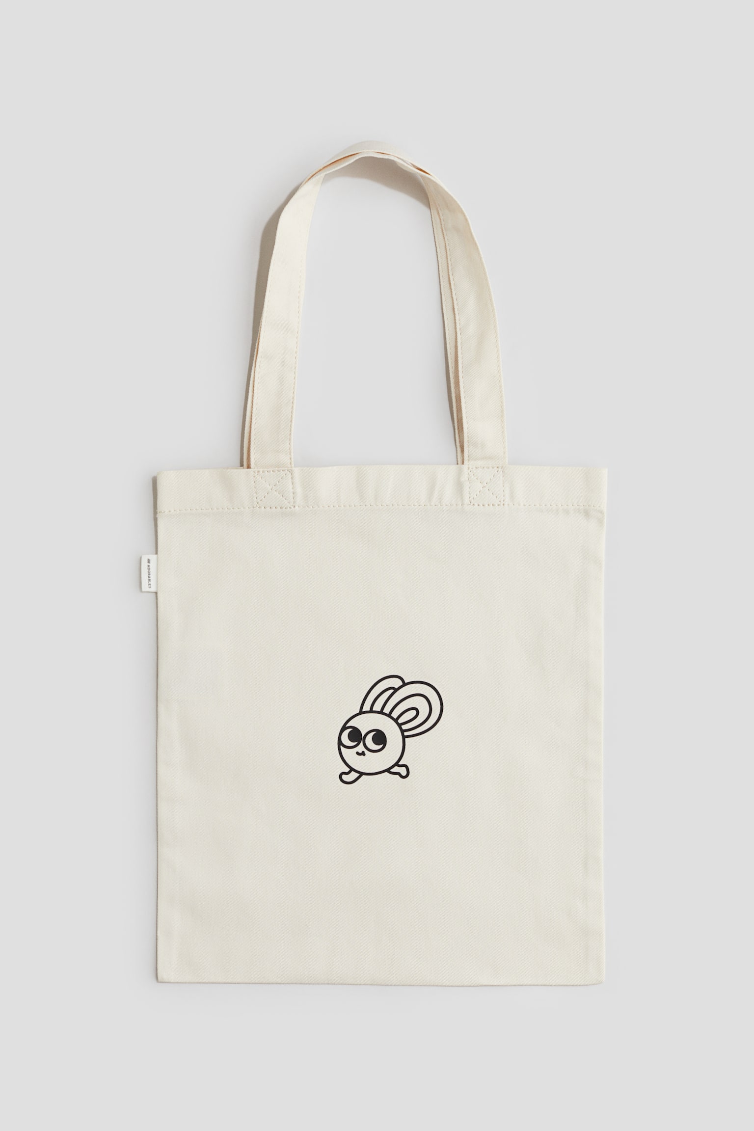 Totebag i bomull med tryckt motiv - Ljusbeige - 1