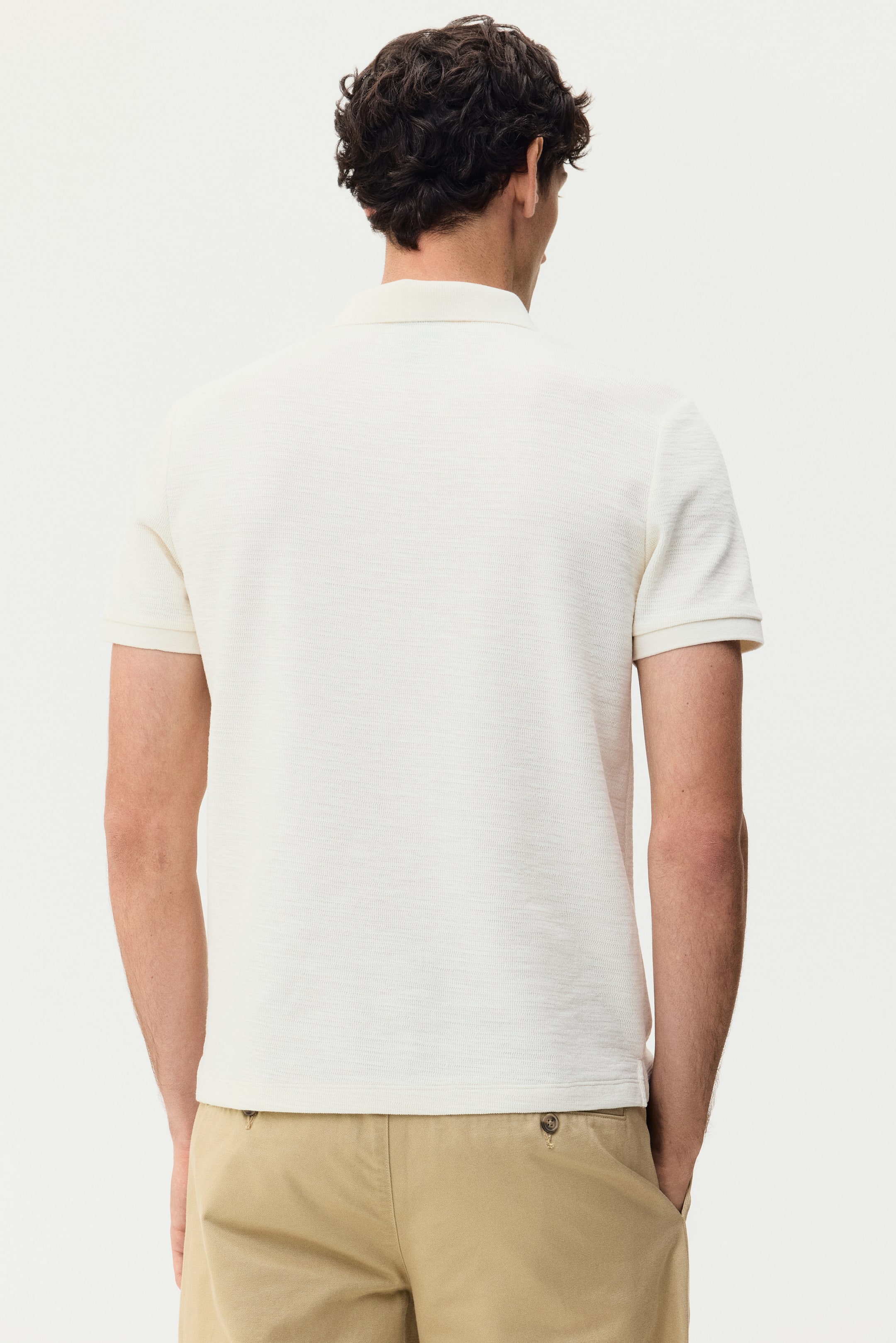 הצגת תמונה גדולה יותר: חולצת פולו מסריג ז'קארד Slim Fit - קרם  - Men | H&M IL 5