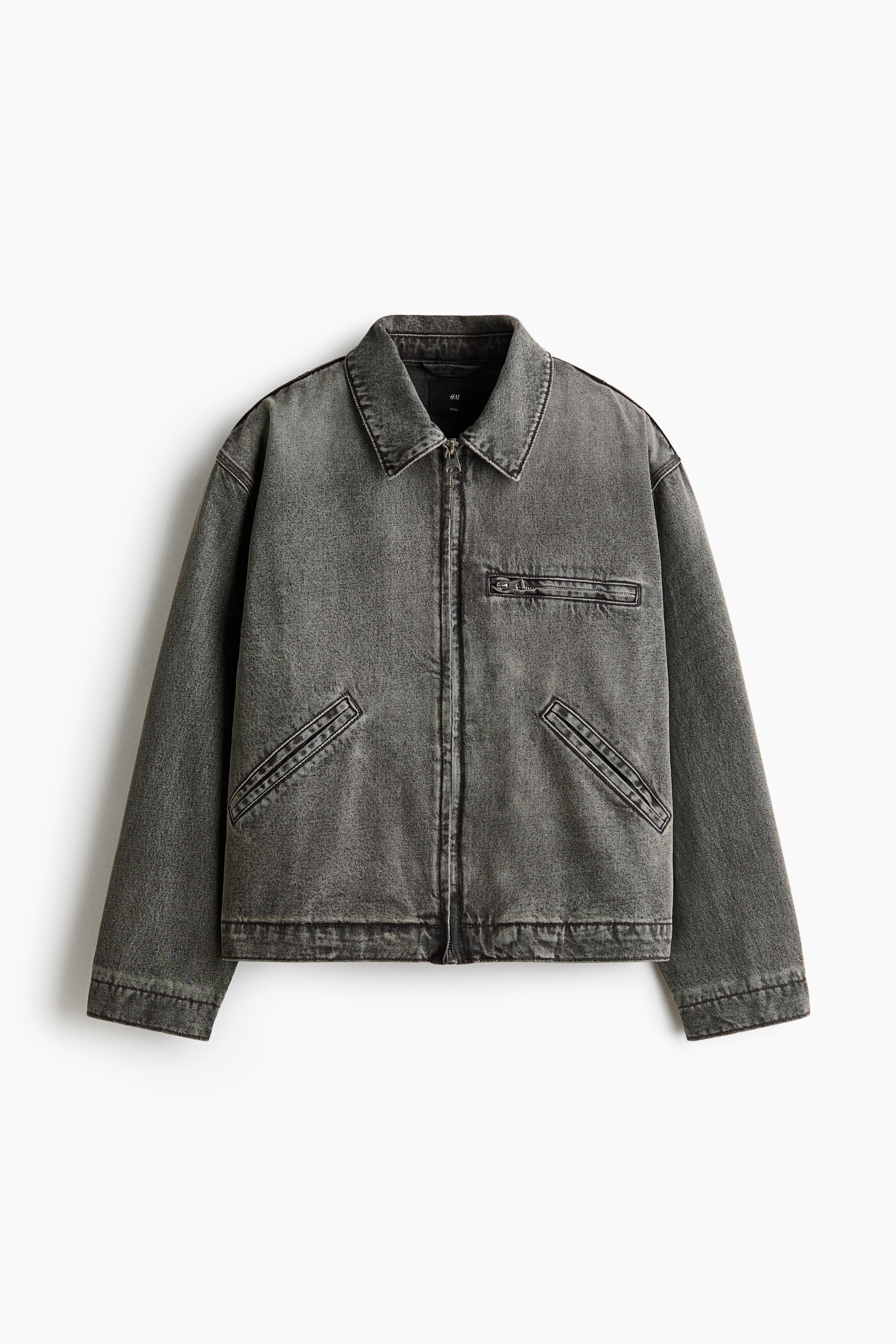 View larger image: A dark gray washed denim jacket is facing front, featuring a pointed collar, a full-length zipper closure, one horizontal zippered chest pocket, and two angled slash pockets at the lower front.