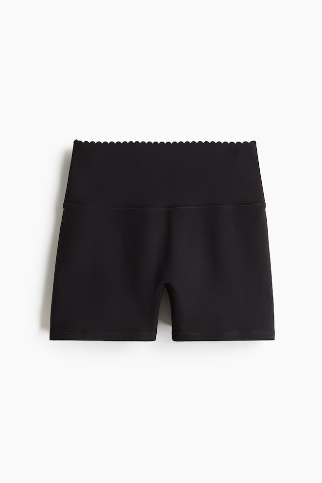 Sports hotpants with SoftMove™ - Black - 1