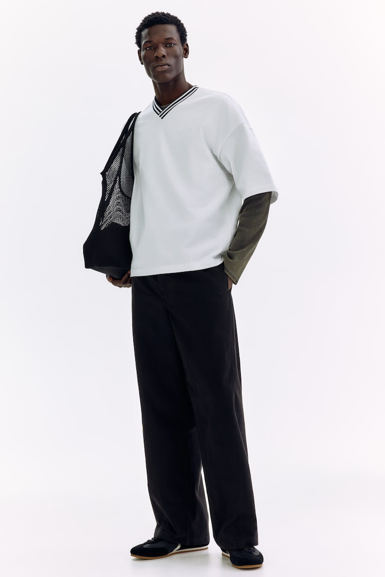Pantalone sa kosim šavovima Relaxed Fit