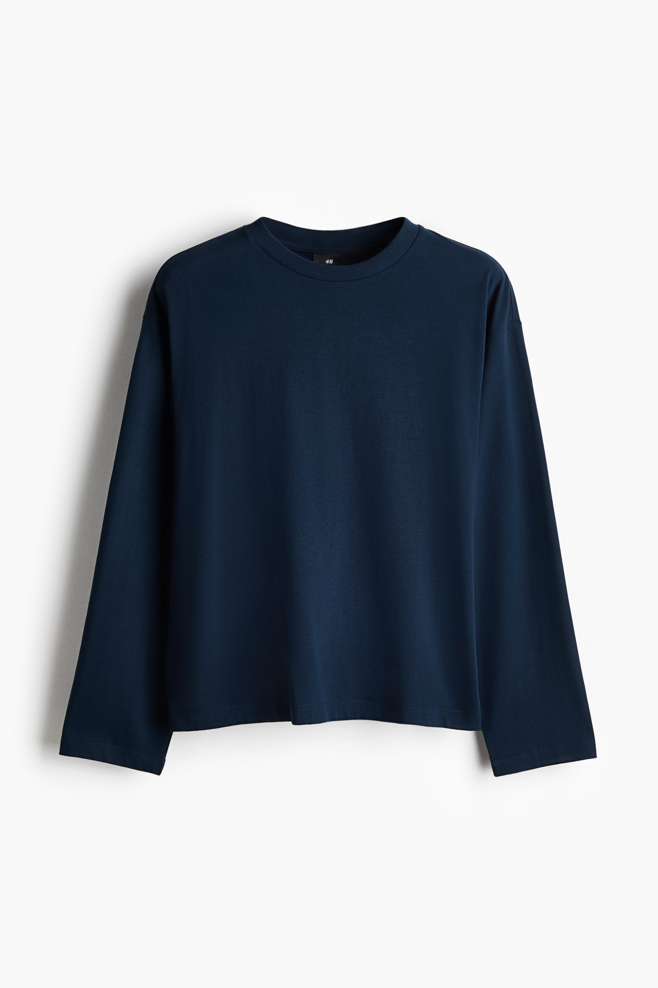 Zobacz większy obraz: Dżersejowy top z długim rękawem Oversized Fit - Navy blue - ON | H&M PL 1
