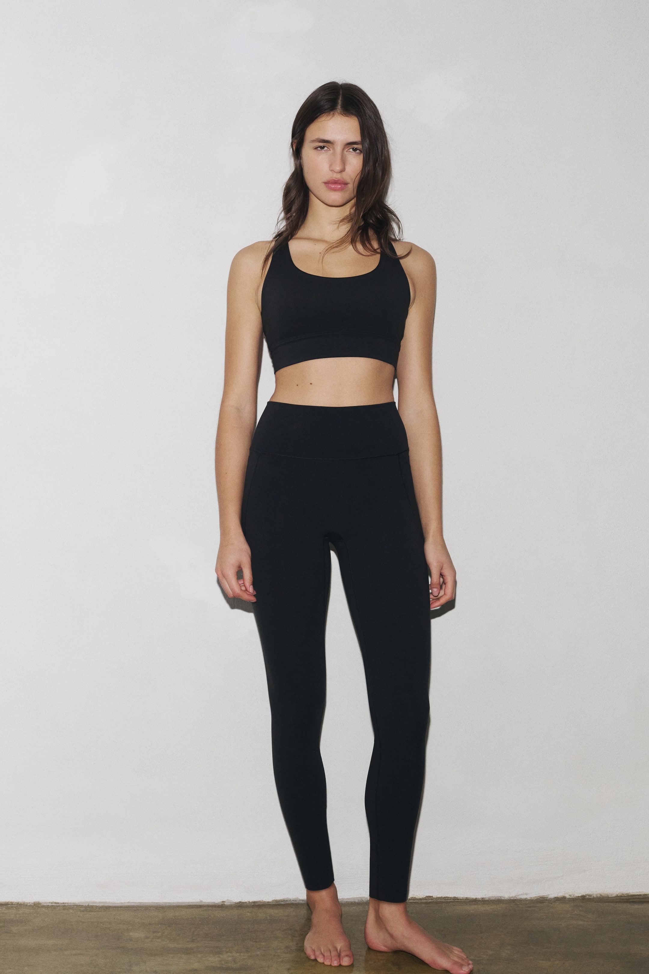 Visualizza immagine più grande: Leggings sportivi in SoftMove™ con tasche - Nero - DONNA | H&M IT 1
