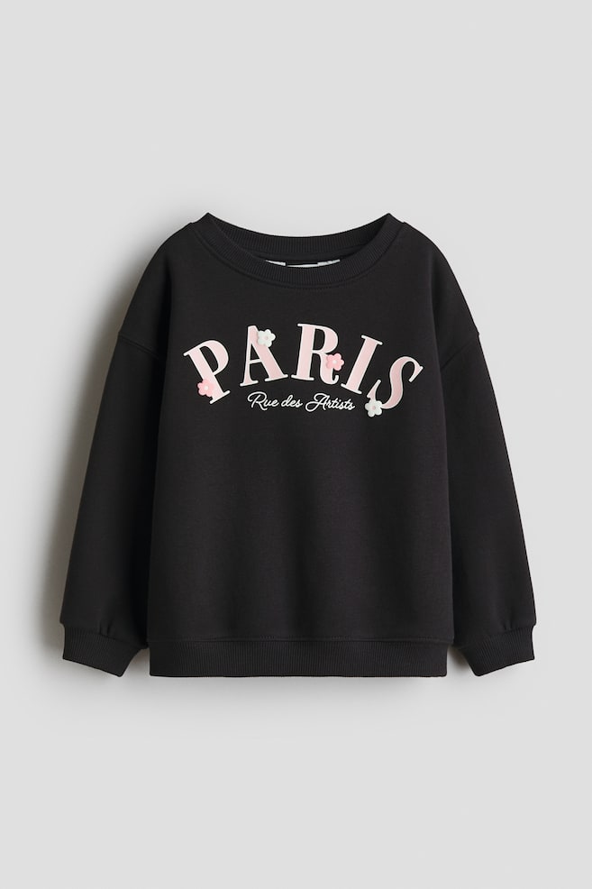 Bedrucktes Sweatshirt mit angerauter Innenseite - Schwarz/Paris/Hellbeige/Leopardenprint/Hellbeige/Geblümt - 1