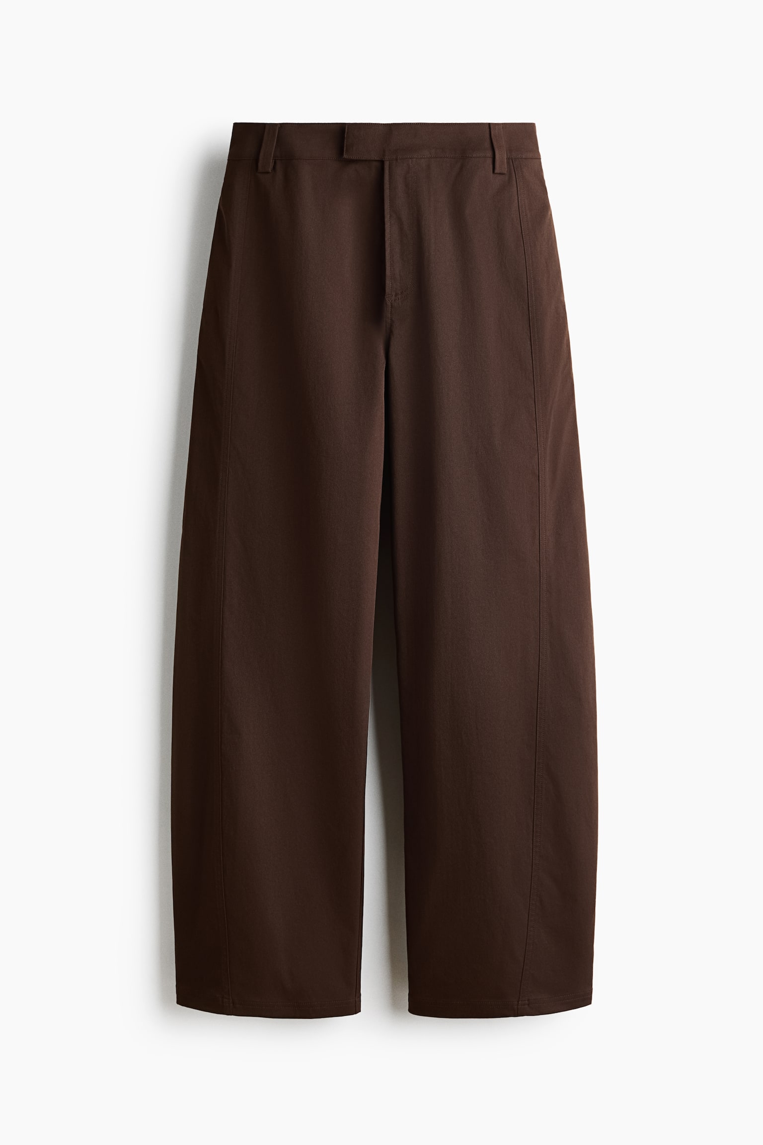 Dark brown twill trousers are shown from the front, featuring a structured barrel-leg silhouette with prominent forward-facing side seams. The design features an extended waistband with belt loops, a zip fly, and discreet side pockets. - 1