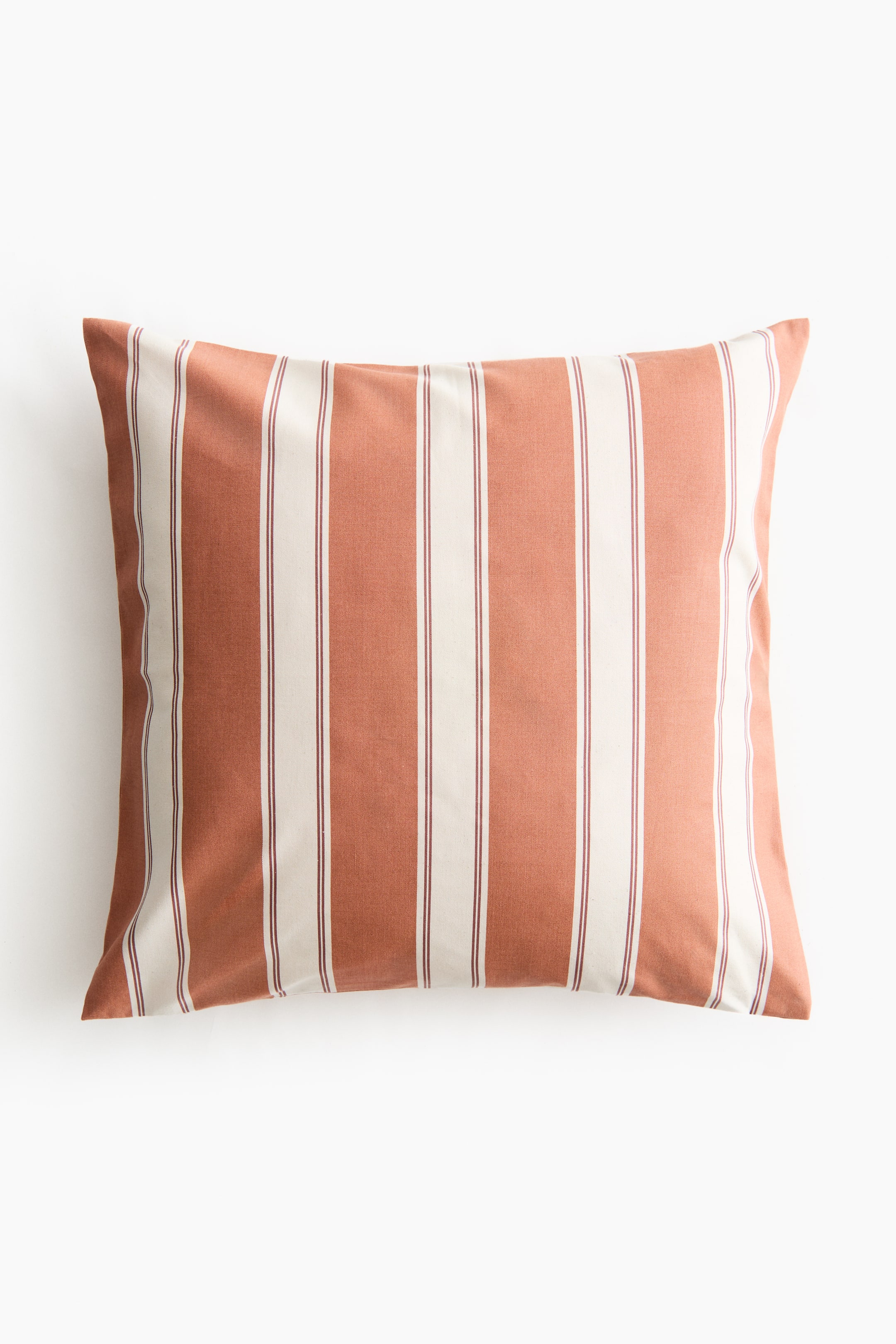 View larger image: A rectangular cushion cover is shown from the front, featuring vertical stripes that alternate between terracotta and off-white. The off-white stripes are bordered by thin burgundy lines.