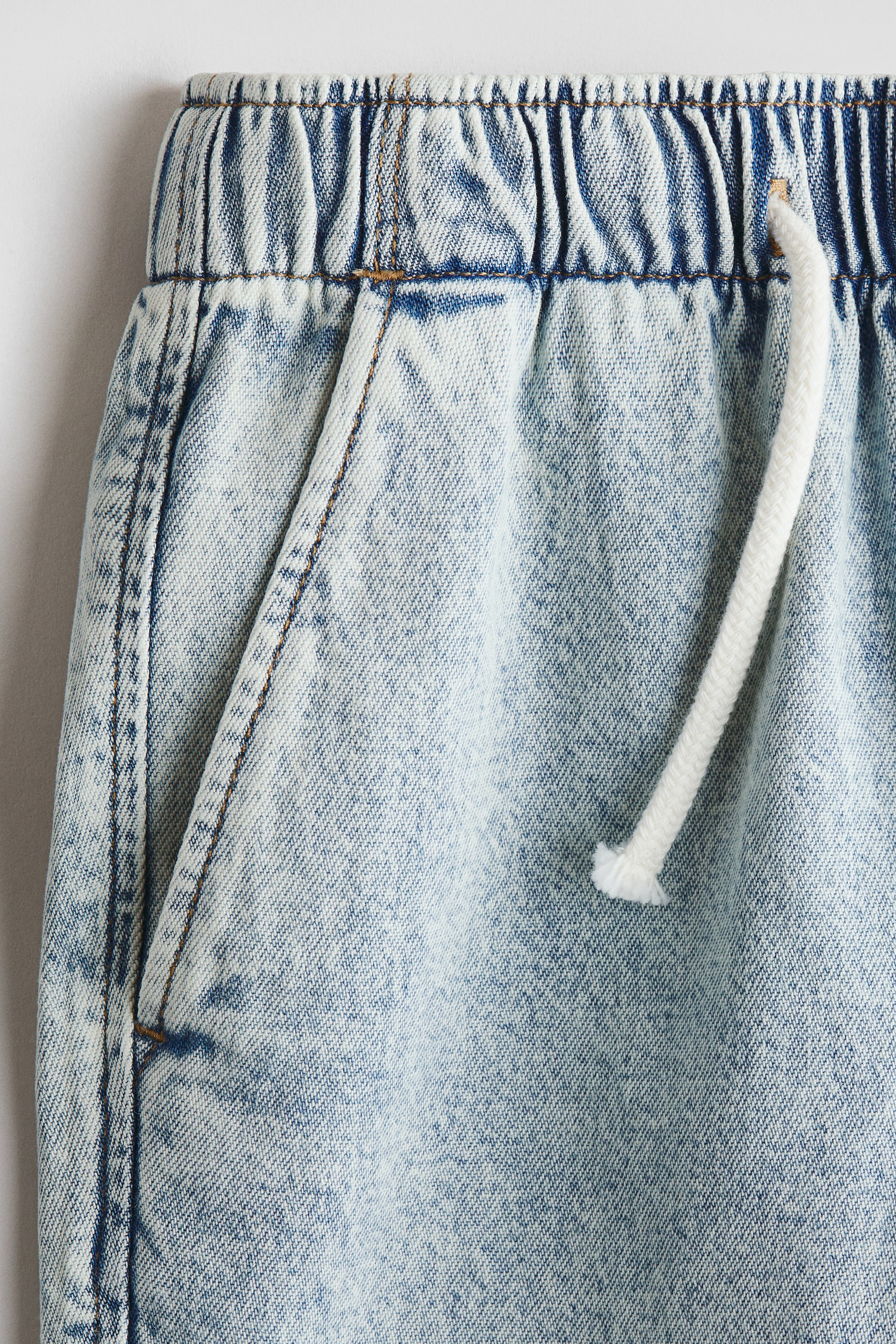 View larger image: Cotton Denim Joggers - Washed light denim blue - Kids | H&M US 2