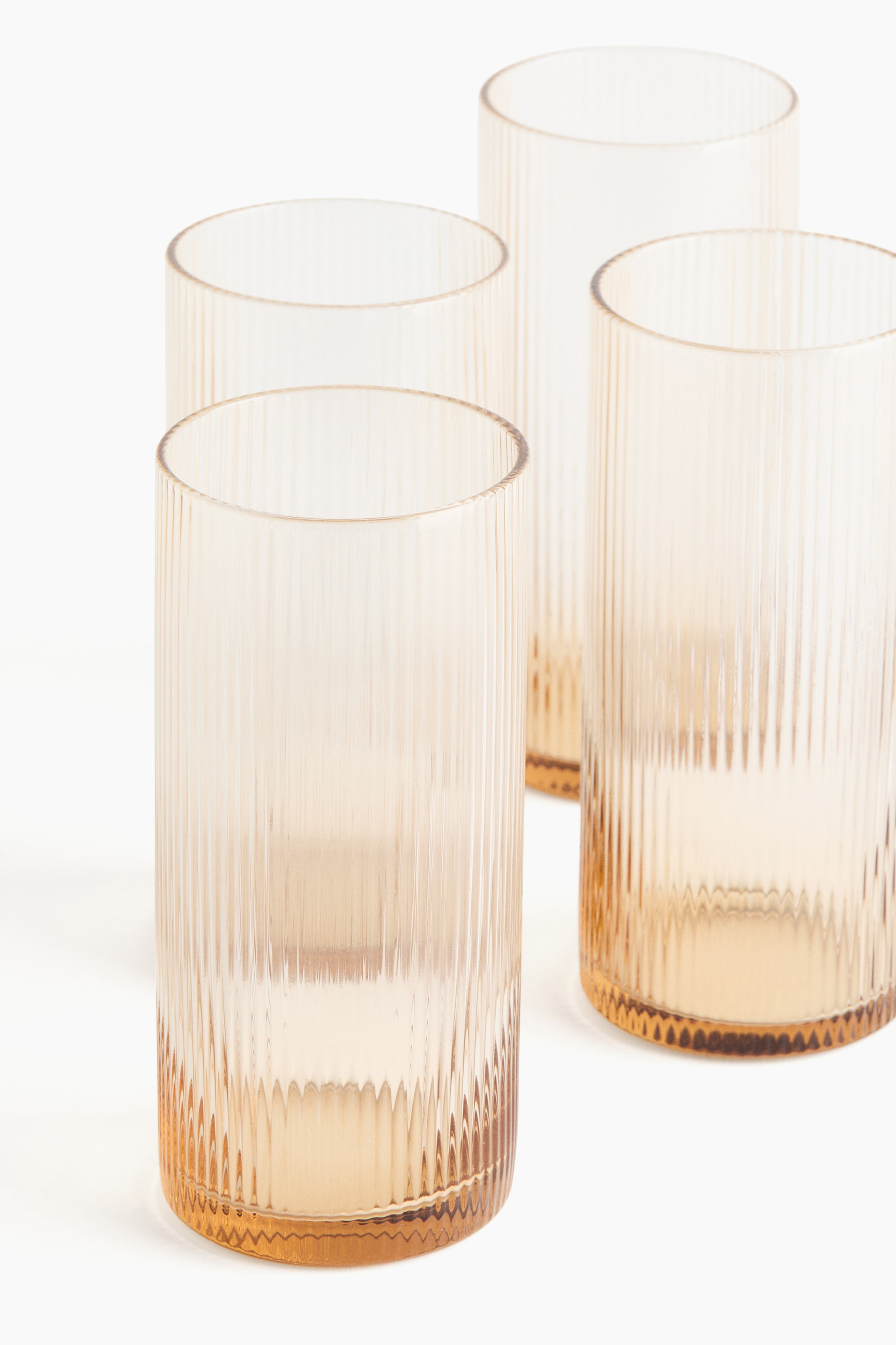 Ver imagem maior: Pack de 4 copos altos com efeito estriado - Bege - HOME | H&M PT 4