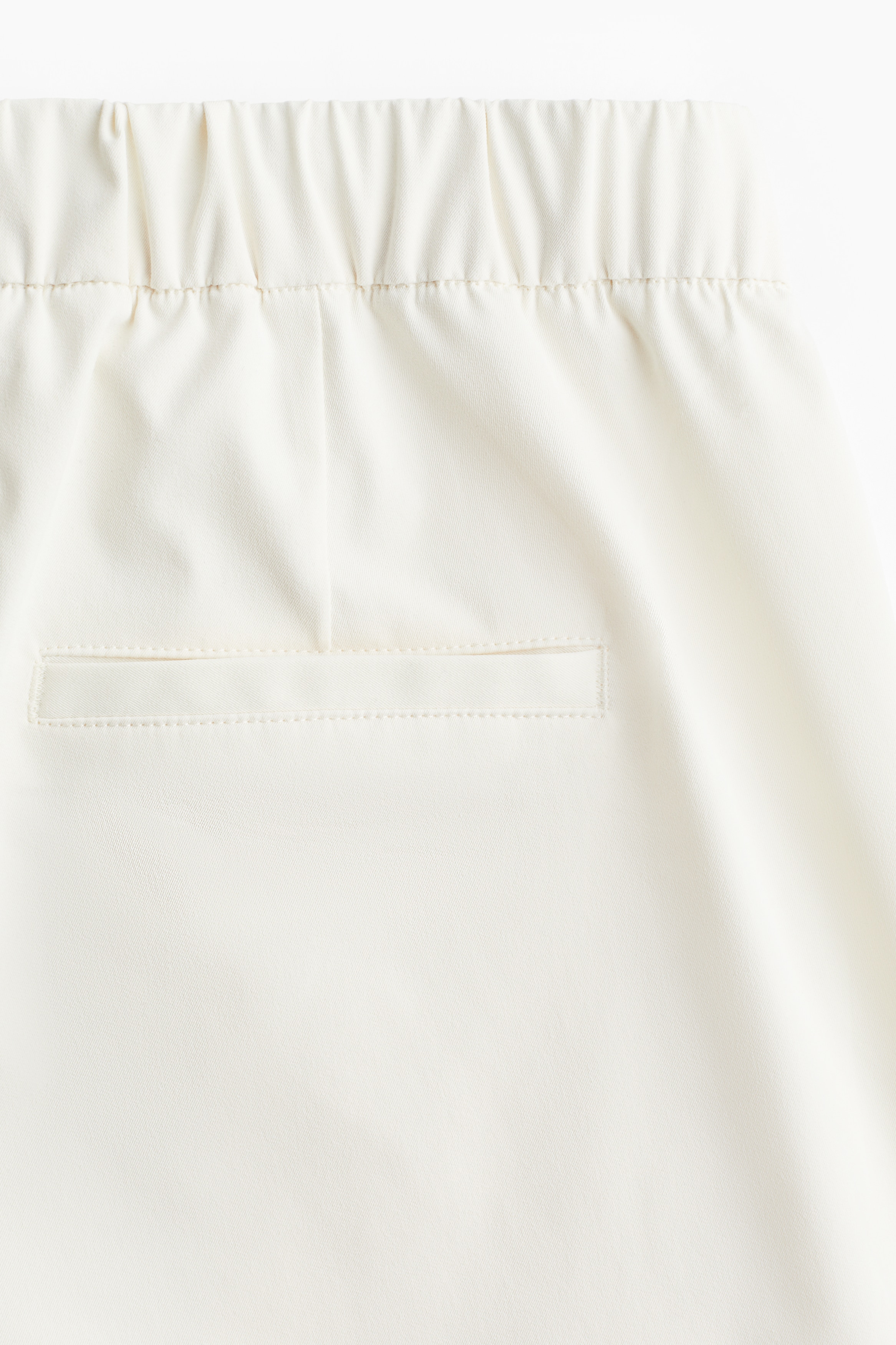 Ankle-length barrel-leg trousers
