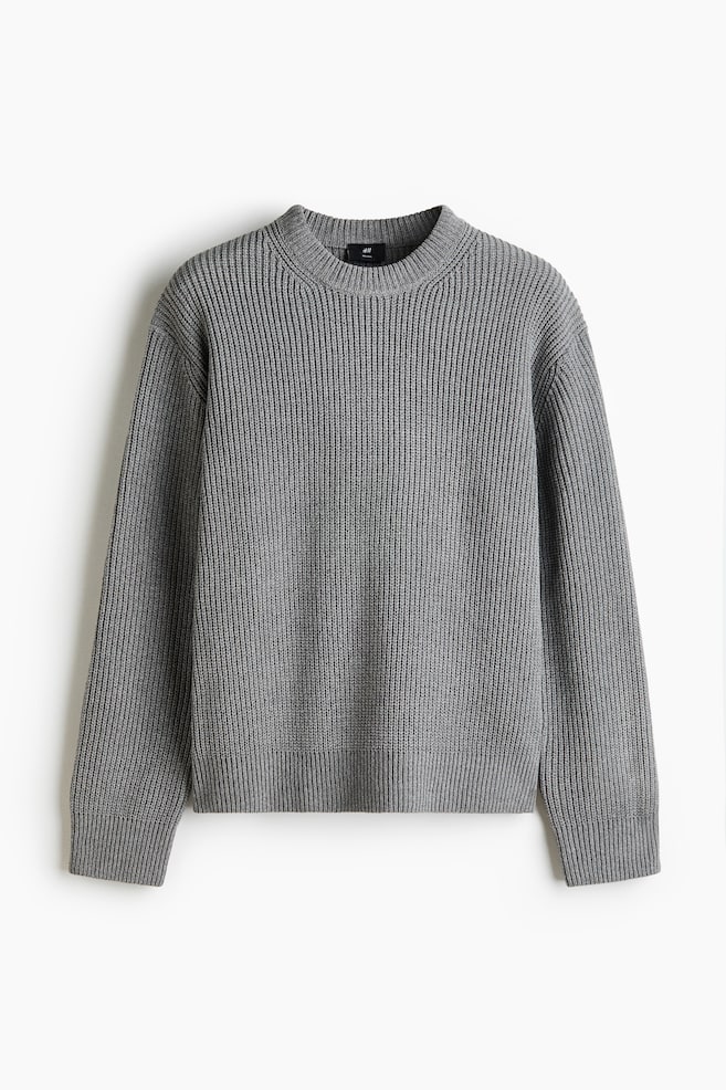 A grey ribbed jumper is showcasing its front view. It features a crew neck, long sleeves with ribbed cuffs, and a ribbed hem. - 1