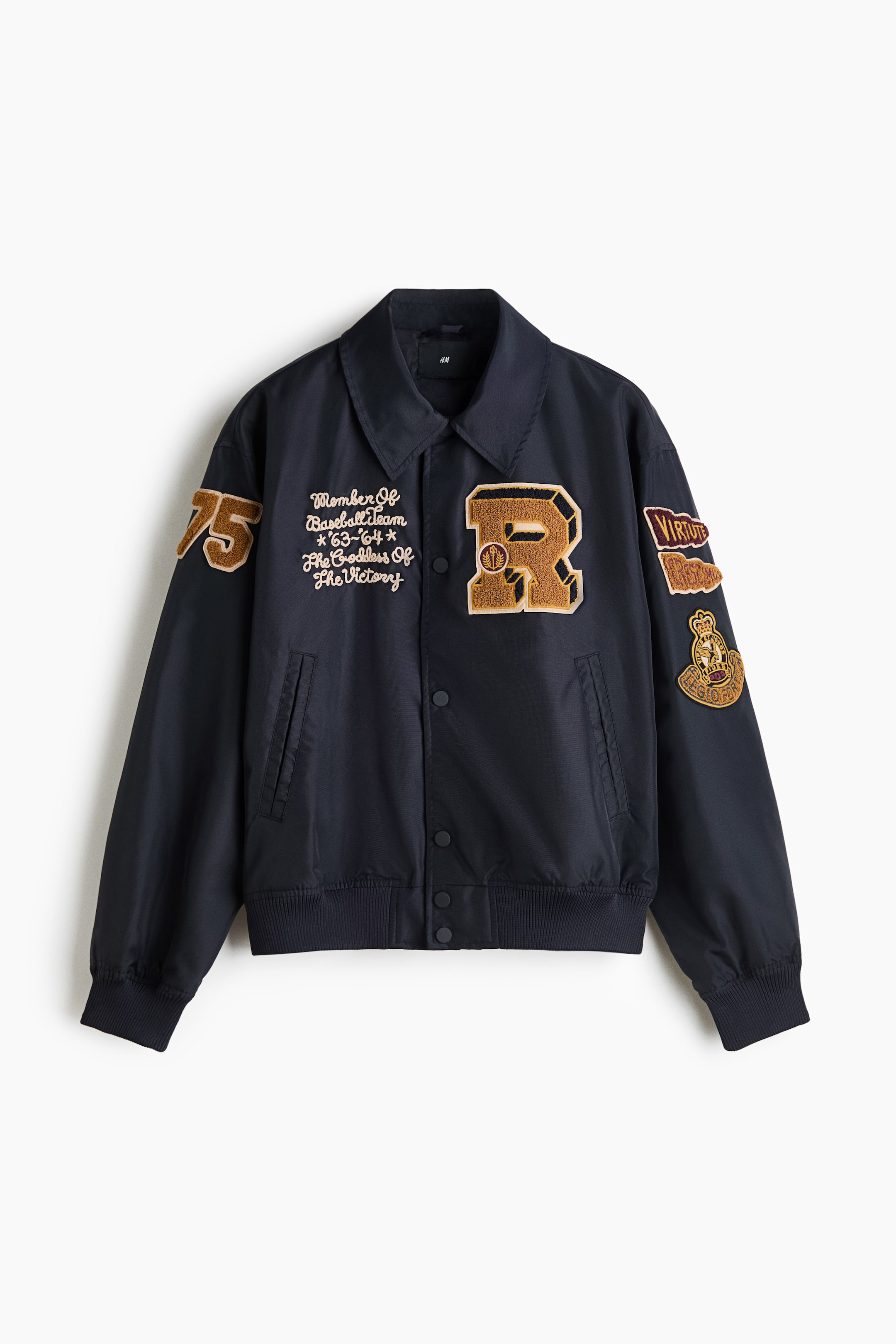 View larger image: A navy blue varsity-style jacket is shown from the front, featuring a point collar, snap-button closure, and ribbed cuffs and hem. The design is decorated with a large yellow and brown chenille "R" patch on the left chest, white embroidered cursive text on the right chest, and multiple collegiate-themed patches on both sleeves.