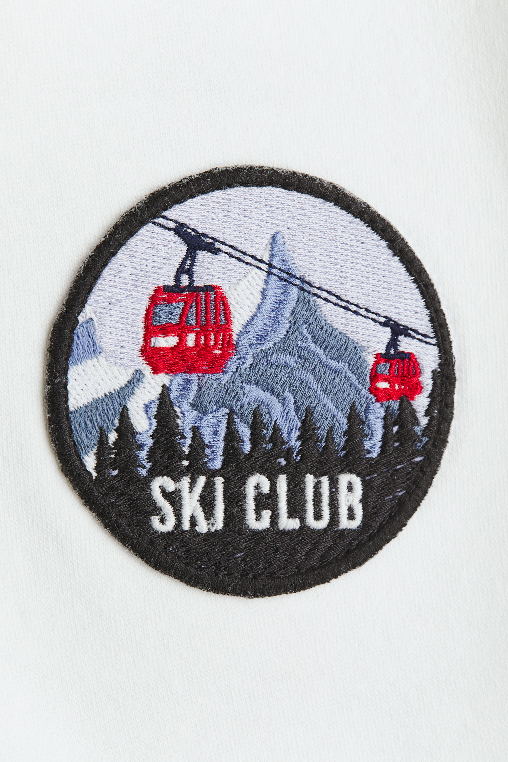 拡大画像を表示: オーバーサイズ デザインスウェットパーカ - ホワイト／Ski club - Kids | H&M JP 3